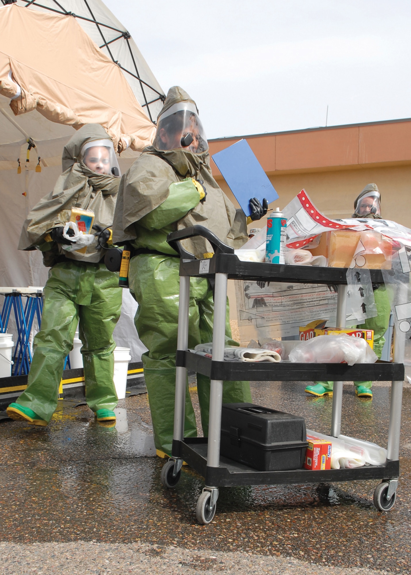 Staff Sgt. Melissa Johnson, 56th Medical Group medical technician, and Staff Sgt. Cynthia Waseta, 56th Medical Support Squadron health service management, make sure they have the necessary supplies for decontamination of simulated victims during the exercise Tuesday.U.S. Air Force photo/ Airman 1st Class Ronifel Yasay.)