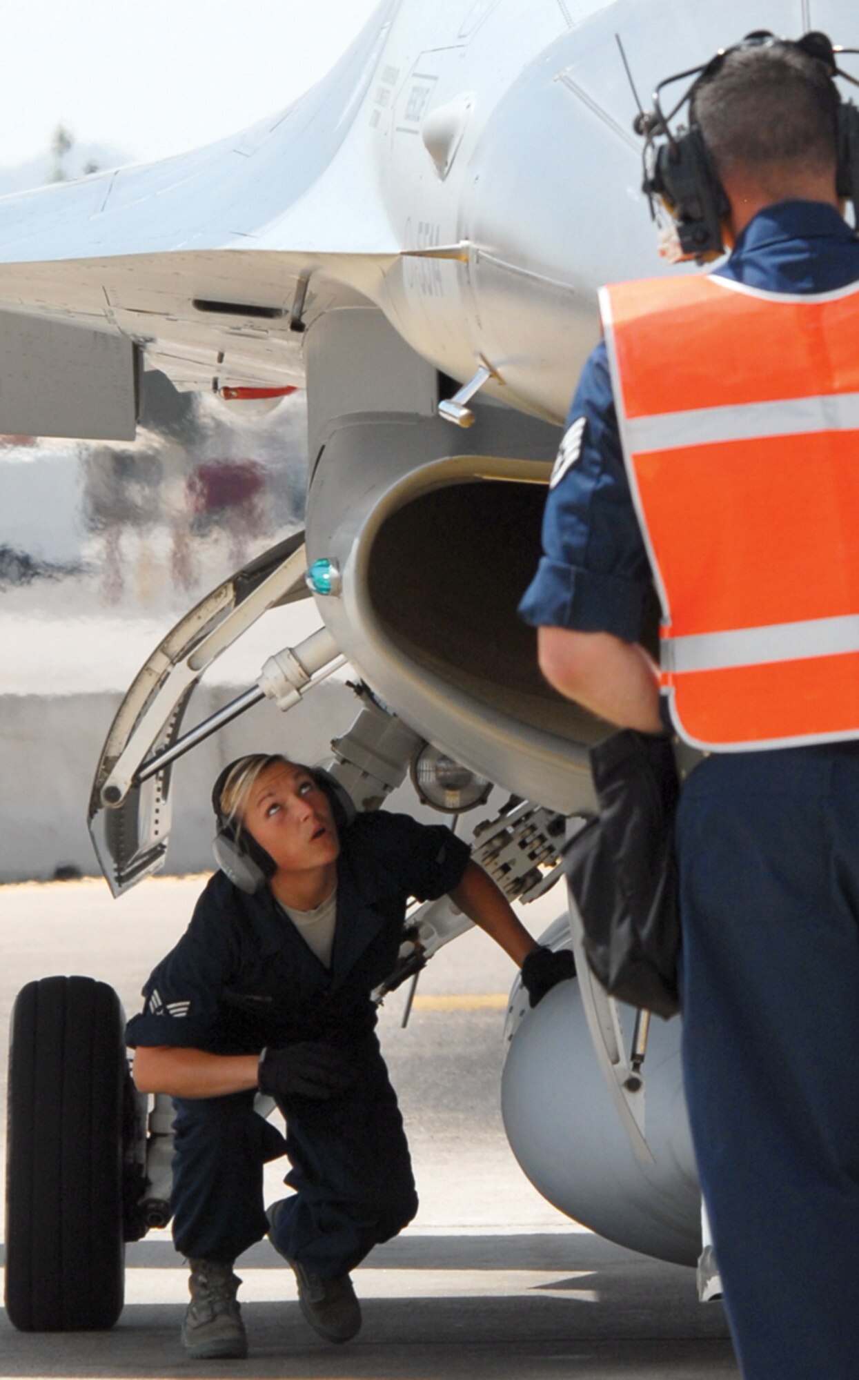 Senior Airman Emily Jones, 56th Maintenance Operations Squadron end of runway team member, does an inspection. (U.S. Air Force photo/ Debbie Silliman Wolfe)