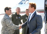Right to left, California Governor Arnold Schwarzenegger is welcomed to Travis Air Force Base by 60th Air Mobility Wing Vice Commander Colonel James Crowhurst, 60th AMW Operations Group Commander Colonel James Baron and the 349th Air Mobility Wing Vice Commander Colonel Barrett Broussard.   (U.S. Air Force photo by Civ/Nan Wylie)