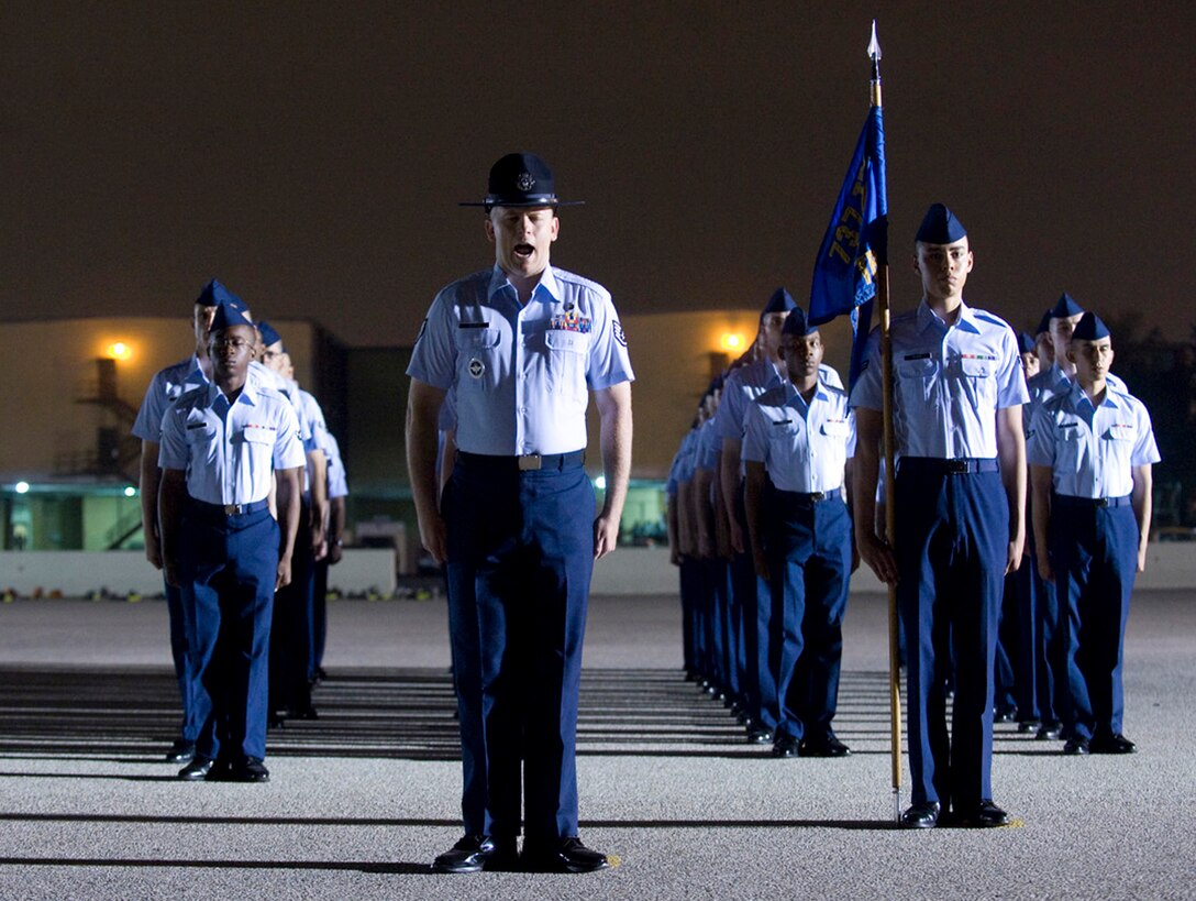 Staff Sgt. Robert George prepares his flight of basic trainees for graduation day May 5 at Lackland Air Force Base, Texas. Sergeant George is a military training instructor assigned to the 324th Training Squadron.  (U.S. Air Force photo/Master Sgt. Cecilio Ricardo)