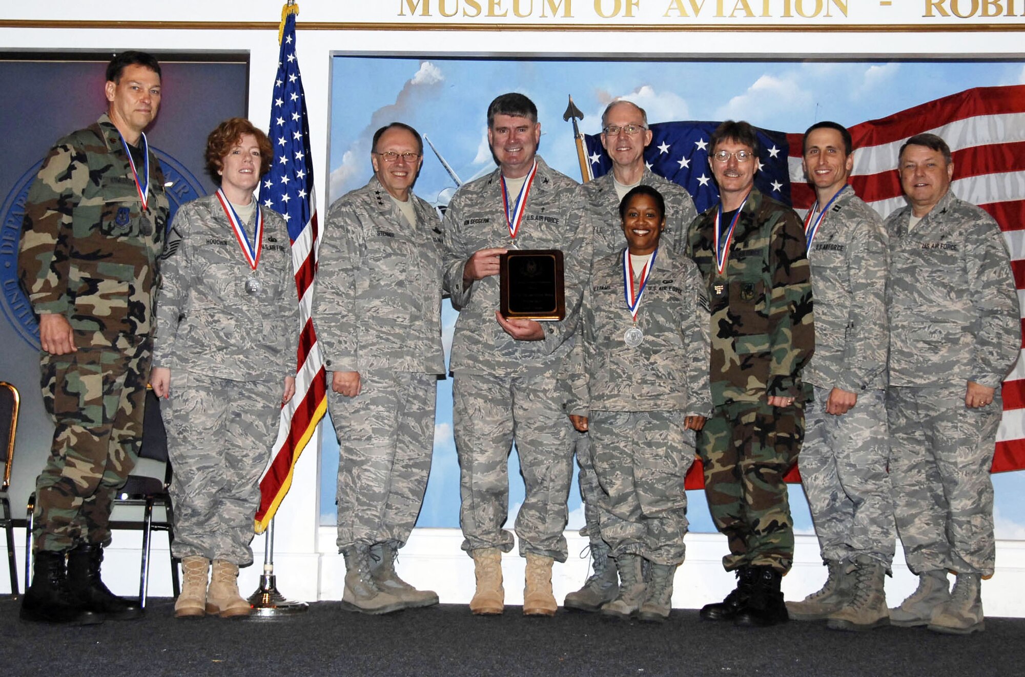 ROBINS AIR FORCE BASE, Ga. -- 349th Air Mobility Wing Chaplain's office won the Air Force Reserve Command Chaplain Readiness Award for 2007-2008.  The award is given to recognize the AFRC Chaplain Team demonstrating outstanding ministry and ministry support while deployed in time of war, Air Expeditionary Force Operations, contingency, national emergency or exercise.  (All members are assigned to the 349th Wing Chaplain's office unless otherwise noted: left to right - Maj. Kenneth G. Rowley, Technical Sgt. Rita K. Houchin, Lt. Gen. Charles E. Stenner, Air Force Reserve Command, commander, Col. Lyle E. "Von" Von Seggern, Brig. Gen. Jack Sewell, Air Force Chaplain's office, Staff Sgt. Danielle R. Williams, Lt. Col. Gregory S. Stringer, Capt. Andrew J. Edwards and Col. Donald G. Smith, AFRC Chaplain) Not pictured: Chaplain (Maj.) Le Bane Hall, Chaplain (Capt.) Van N. Dinh, Senior Master Sgt. Alice Munoz, Technical Sgt. Stacey D. Jackson and Staff Sgt. Michael W. Pierce.
U.S. Air Force courtesy photo