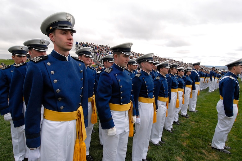 Cadets stand at attention during a graduation parade May 27 at the U.S. Air Force Academy, Colo. Military formation and drill are a regular part of life during a cadet's four-year stay at the Academy. (U.S. Air Force photo)
