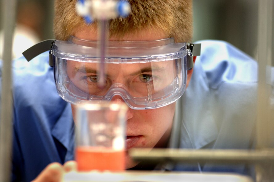 A cadet conducts an experiment during a chemistry class at the U.S. Air Force Academy in Colorado Springs, Colo. Cadets take seven classes each semester in order to graduate with bachelor degrees and Air Force commissions. (U.S. Air Force photo)