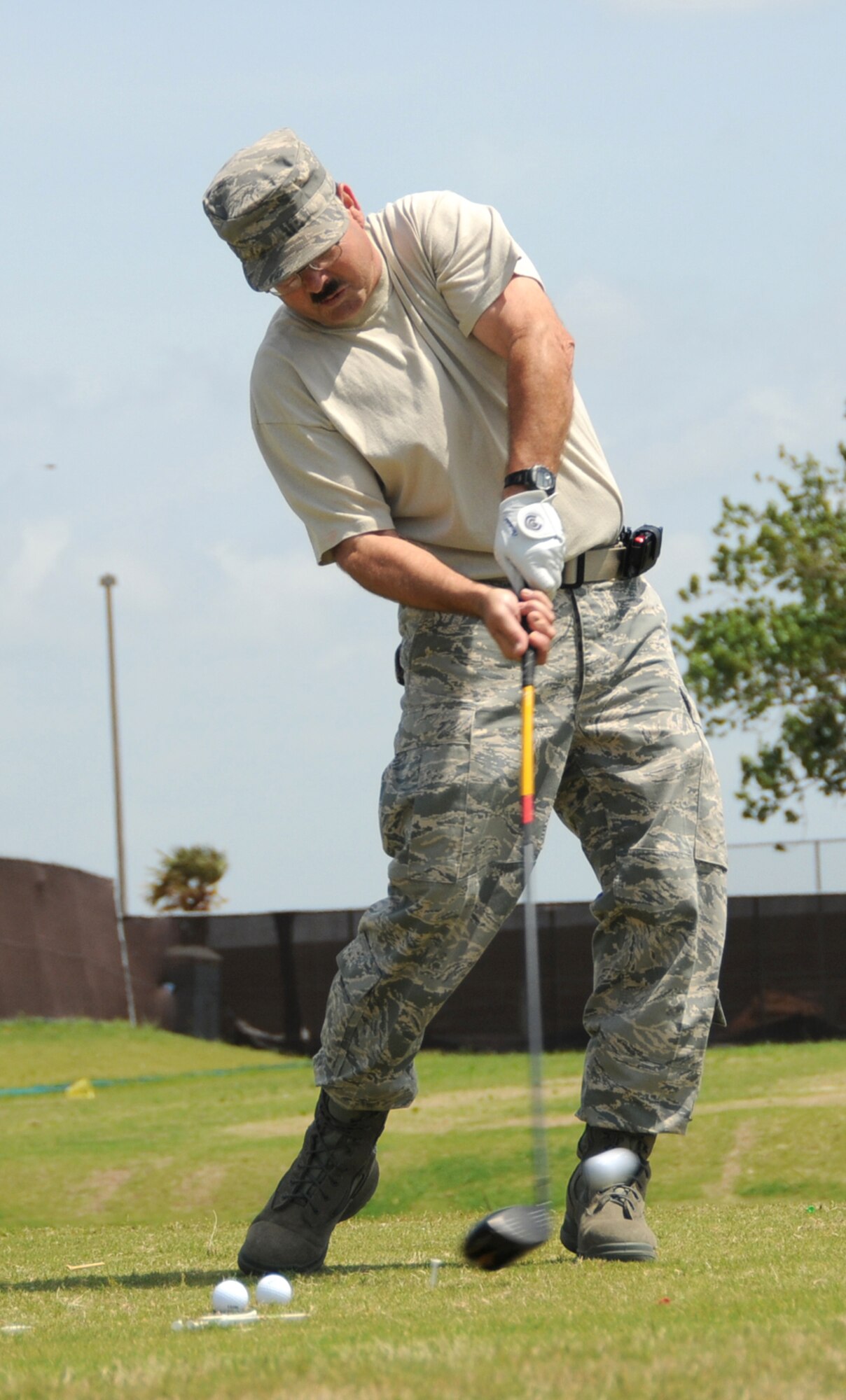 James Kinsey, 85th Engineering Installation Squadron, takes a swing during the driving range competition.  His drive was about 250 yards.  (U.S. Air Force photo by Kemberly Groue)