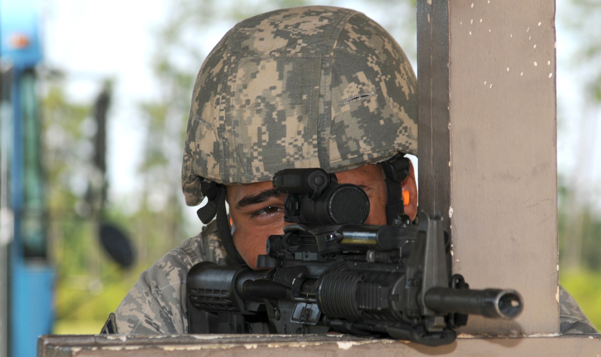 Senior Airman Derik Hoskins practices firing an M4 carbine during training at Keesler’s Camp Keller firing range in Woolmarket, April 24.  (U.S. Air Force photo by Senior Airman Eric Summers)
