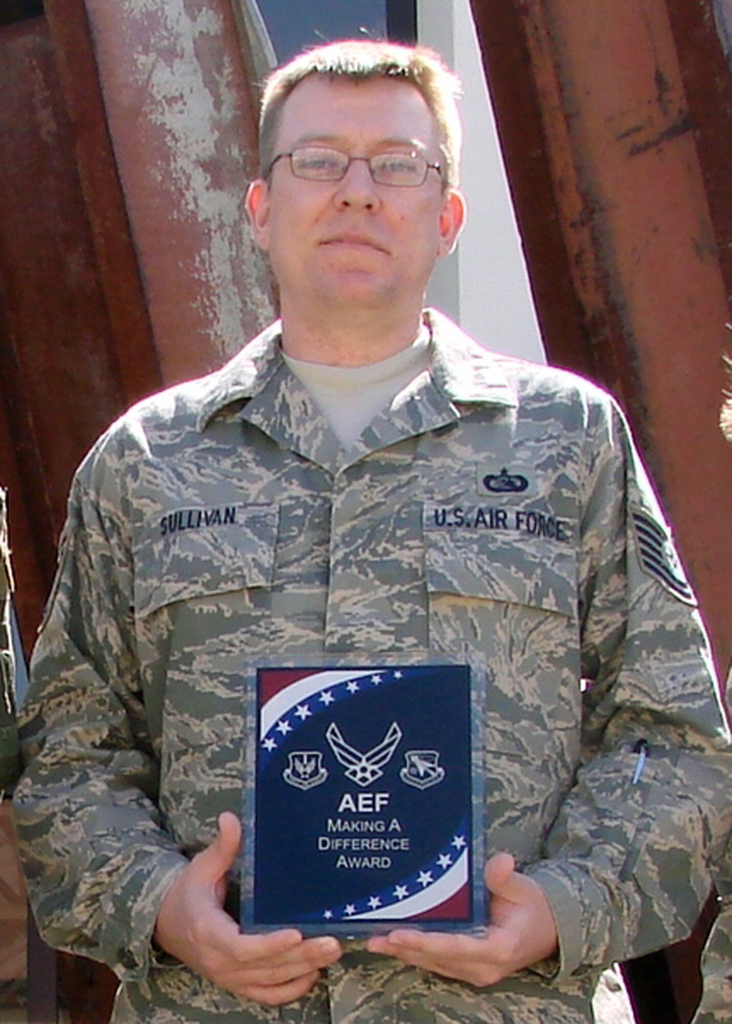 TYNDALL AIR FORCE BASE, Fla. -- Tech. Sgt. Hal Sullivan, 601st Combat Reports Cell, who is deployed from Buckley AFB, recently received the Air and Space Expeditionary Force Making A Difference Award. Sergeant Sullivan created and improved procedures, reducing man-hours and progressing mission efficiency. He also co-organized a paintball event to promote esprit de corps within the unit. He set the example as an excellent wingman, said Tech. Sgt. Leandra Koerper, 601st Air and Space Operations Center. The Making A Difference Award is given to members deployed to the 601st AOC for going above and beyond the call of duty. Sergeant Sullivan is deployed from the 460th Space Communications Squadron. (Courtesy photo)                               
