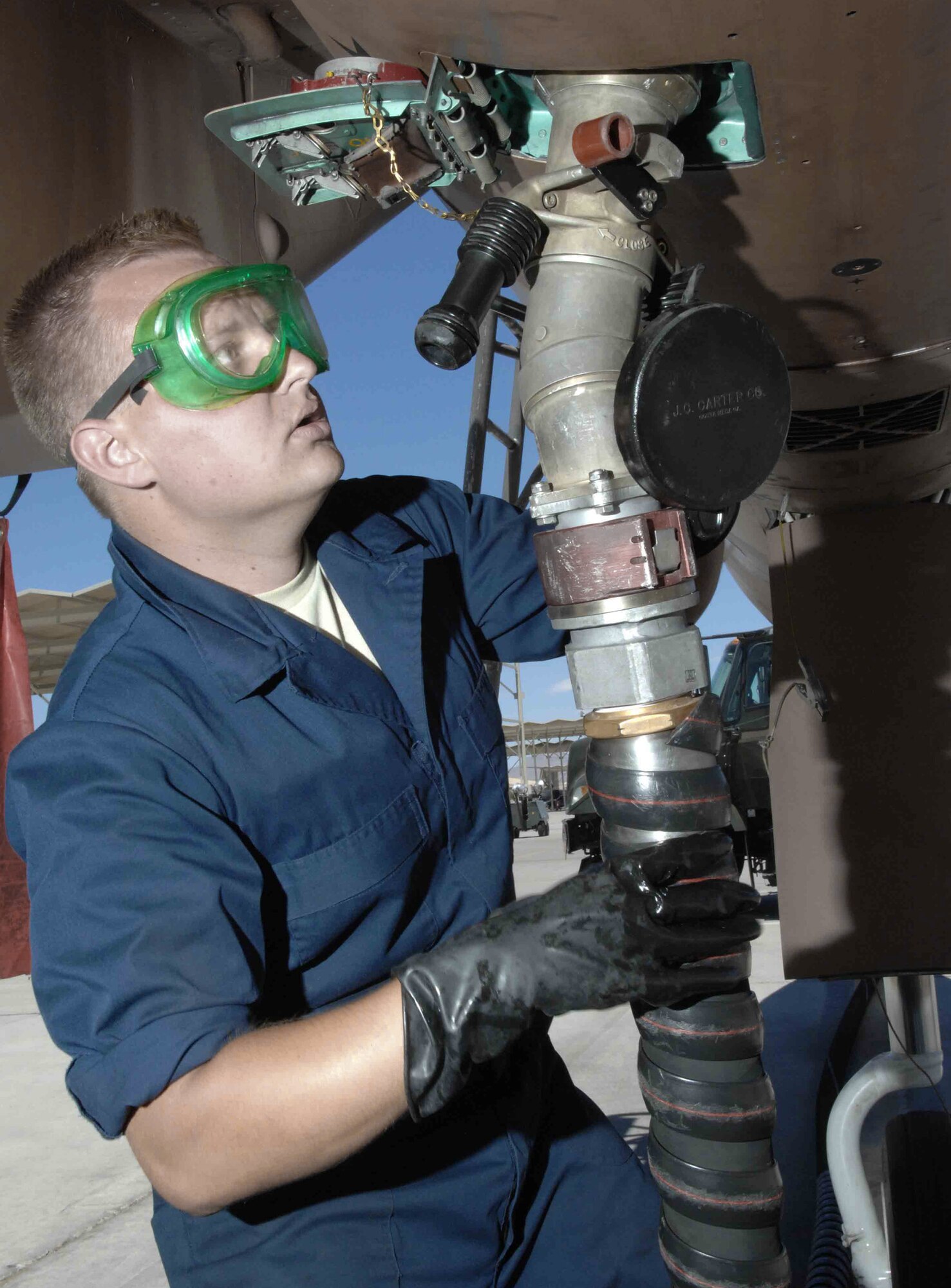 Staff Sgt. Jason Payne refuels an F-15 Eagle at Nellis Air Force Base, Nev. Sergeant Payne is an F-15 crew chief in the 926th Aircraft Maintenance Squadron. The 926th Group is an Air Force Reserve classic associate unit that supports the active-duty Air Air Force Warfare Center at Nellis with Air Force reservists. (U.S. Air Force photo/Senior Airman Larry E. Reid Jr.) 
