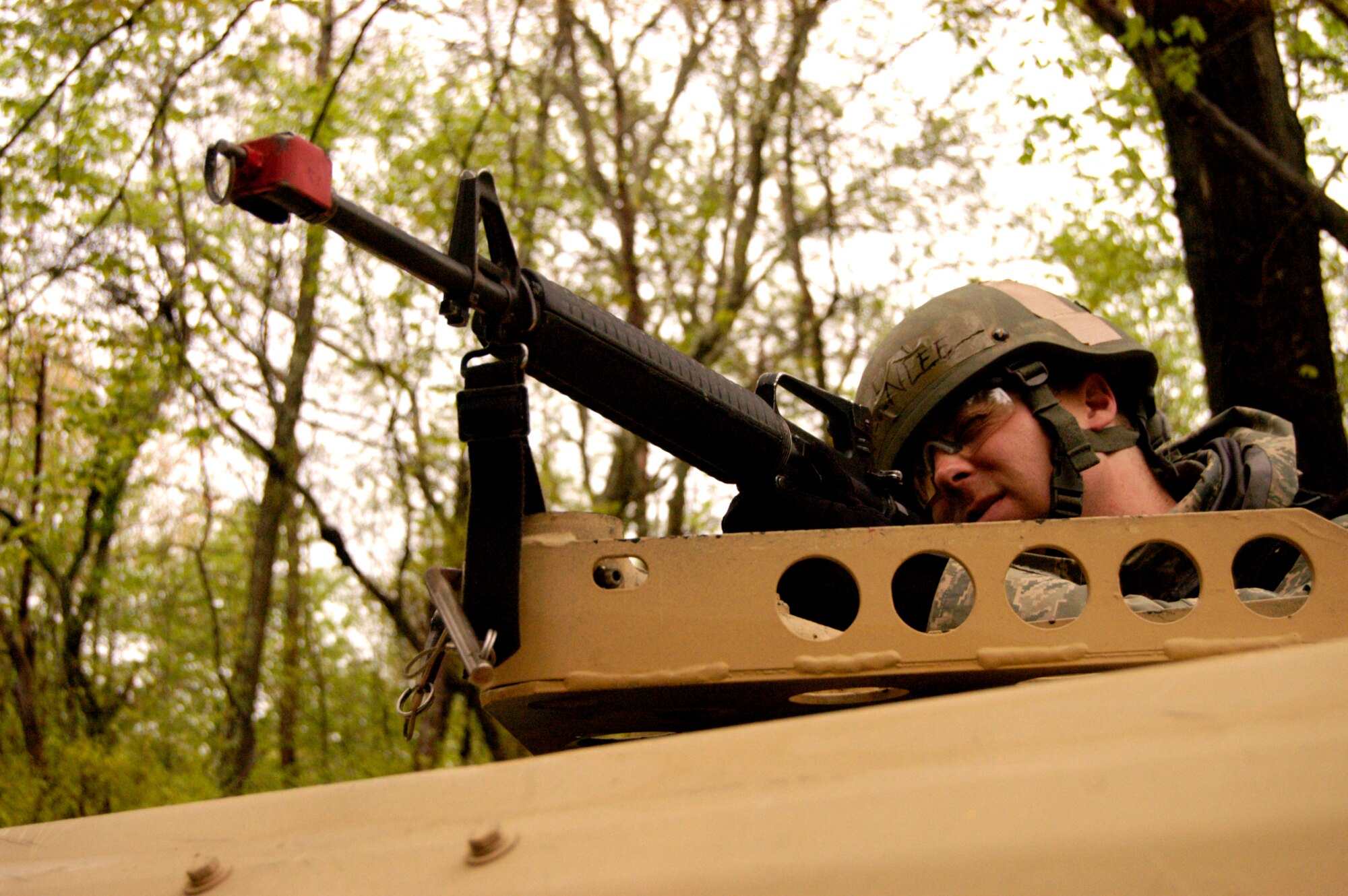 Senior Airman Zachary Greenlee, a student in the Advanced Contingency Skills Training Course from Ramstein Air Base, Germany, participates in a scenario for mounted patrol, or convoy, operations training on May 3, 2009, on a Fort Dix, N.J., range.  ACST, taught by the U.S. Air Force Expeditionary Center's 421st Combat Training Squadron on Fort Dix, prepares Airmen for upcoming deployments.  (U.S. Air Force Photo/Staff Sgt. J.G. Buzanowski)