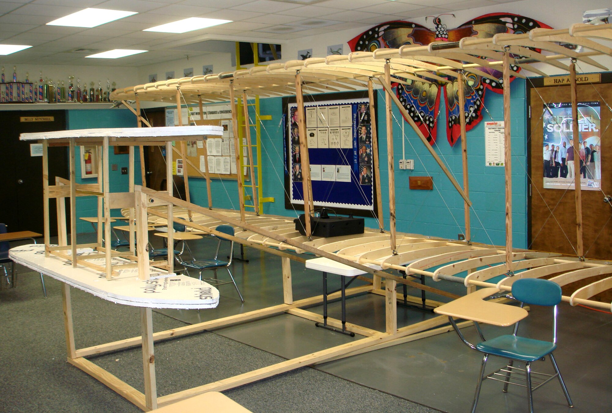 More than 240 cadets from SouthWest Edgecombe High School, N.C., Air Force Junior ROTC Detachment NC-945 built a replica of the Wright Flyer after visiting the Wright Brothers' memorial in Kitty Hawk, N.C. The Wright Flyer replica spans the original dimensions of 18 feet by 40 feet and was displayed in three community parades upon completion in December 2008. (Courtesy photo) 
