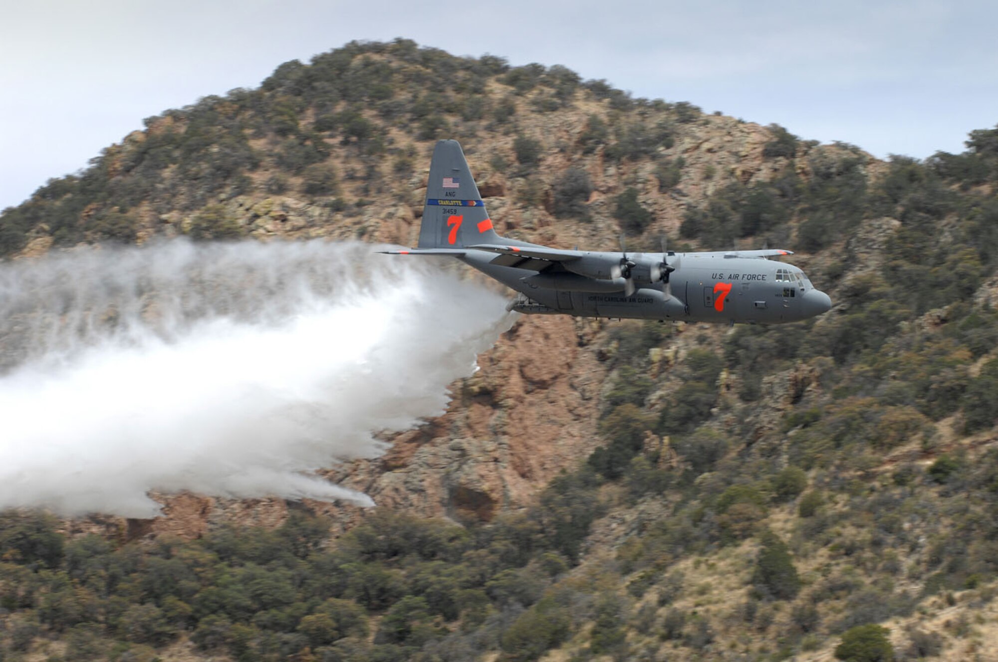 Air National Guard and Air Force Reserve units converged on Tucson, Ariz., in May to take part in MAFFS certification and training 2009. The Modular Airborne Firefighting System is an important and effective tool used to fight wildfires nationwide and is placed onboard the C-130 Hercules aircraft. Four units across the country continue the MAFFS legacy which began in the early 1970s; the 153rd Airlift Wing, Cheyenne, Wyo., ANG, the 145th Airlift Wing, Charlotte, N.C., ANG, the 146th Airlift Wing, Channel Islands, Calif., ANG, and the 302nd Airlift Wing, Air Force Reserve, Colorado Springs, Colo. (Air National Guard photo by Tech. Sgt. Alex Koenig)
