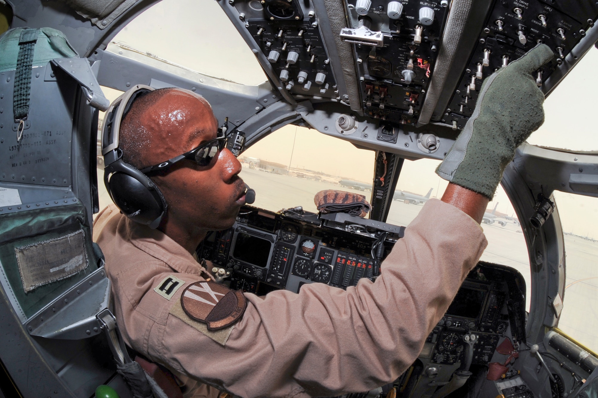 Captain Andre "Vader" Walton, a pilot with the 9th Expeditionary Bomb Squadron, runs a B1-B Lancer through its preflight checklist, May 5, 2009, in and undisclosed location in Southwest Asia.   Prior to every mission the pilot performs preflight checks to ensure all systems are functioning properly.  Captain Walton is native to Raleigh, N.C. and is deployed from Dyess Air Force Base, Texas in support of Operations Iraqi and Enduring Freedom and Combined Joint Task Force - Horn of Africa.  (U.S. Air Force Photo by Staff Sgt. Joshua Garcia/released)