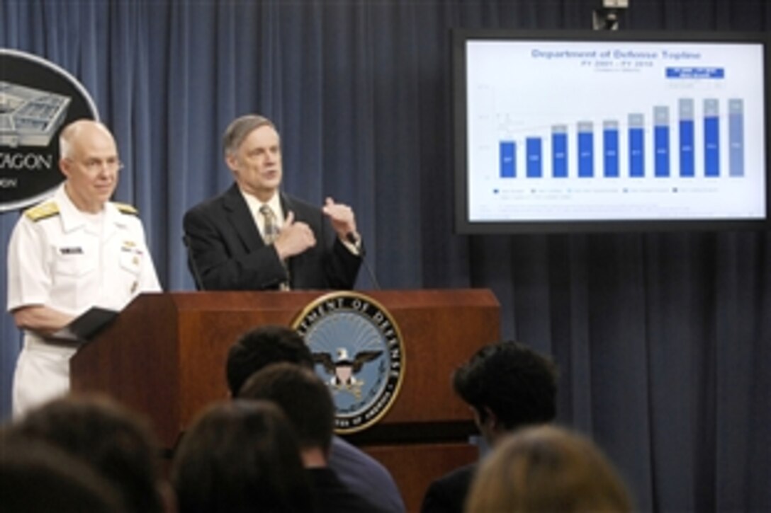 Under Secretary of Defense Comptroller Robert Hale, right, and Navy Vice Adm. Steve Stanley, director, force structure, resources and assessment, Joint Staff, hold a press briefing to discuss President Barack Obama's fiscal 2010 budget proposal at the Pentagon, May 7, 2009.  