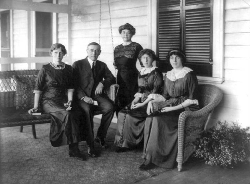 Woodrow Wilson, seated posed on swing on porch, facing front, with his wife and three daughters. Mothers need to be celebrated! President Woodrow Wilson realized this on May 9, 1914, proclaiming the first Mother's Day. He asked Americans on that day to give a public "thank you" to their mothers and all mothers. (Photo credit: 1912. Prints and Photographs, Library of Congress)