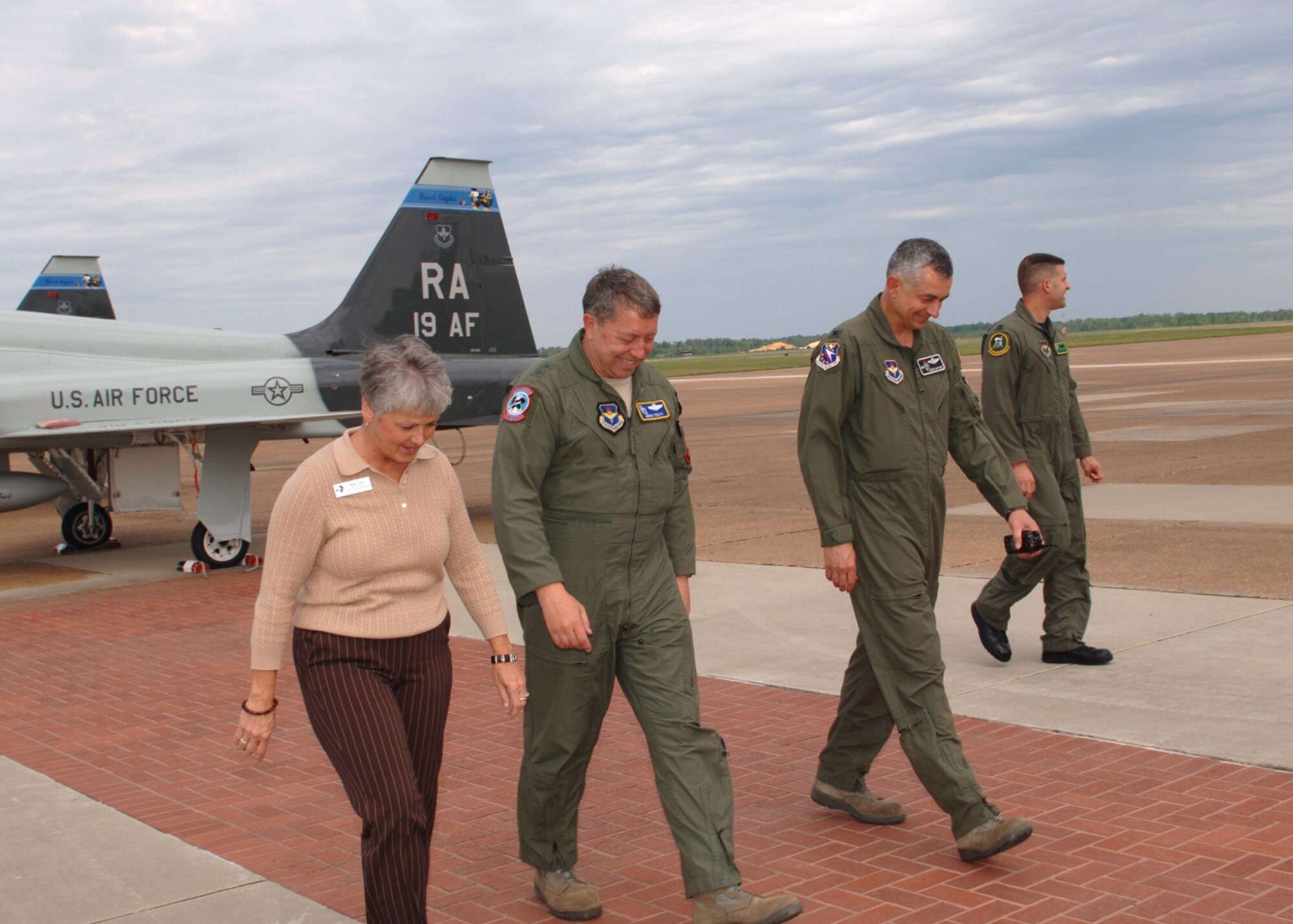 Maj. Gen. Greg Feest, 19th Air Force commander, is greeted by BLAZE Team members Diane Clardy, chief of wing protocol; Col. Roger Watkins, 14th Flying Training Wing commander; and Capt. Nicholas Graham, 49th Flying Training Squadron, May 5. General Feest arrived at Columbus for a three-day visit. (U.S. Air Force photo)