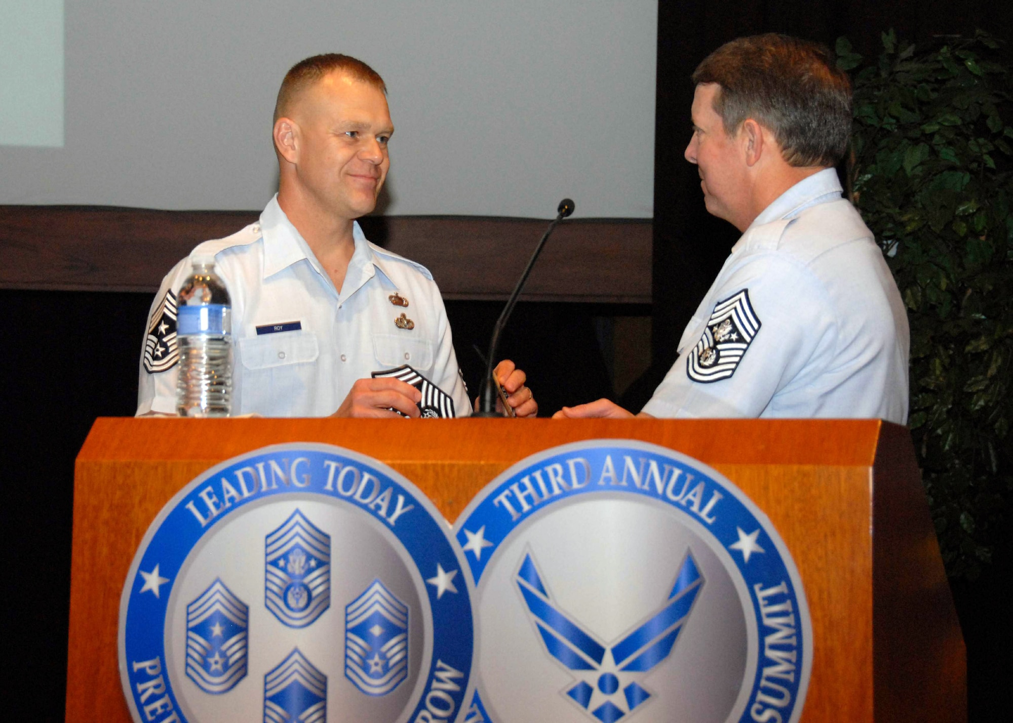 Chief Master Sgt. of the Air Force Rodney J. McKinley (right) introduces his replacement, Chief Master Sgt. James A. Roy, to attendees of the Senior Enlisted Forum May 8 at Maxwell Air Force Base, Ala.  Chief Roy, who currently is the senior enlisted advisor to the U.S. Pacific Command combatant commander, was selected by Air Force Chief of Staff Gen. Norton Schwartz to become the 16th Chief Master Sergeant of the Air Force.  He will assume his duties on June 30, following Chief McKinley's retirement.  (U.S. Air Force photo)