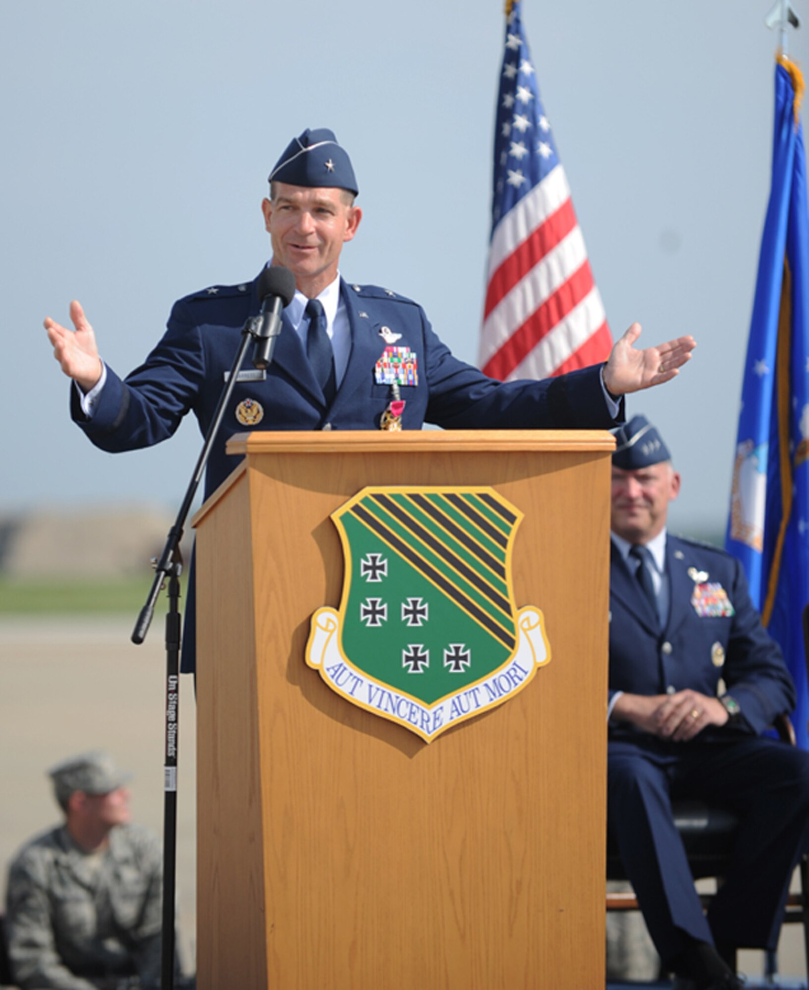 LANGLEY AIR FORCE BASE, Va. -- Brig. Gen. Mark A. Barrett, 1st Fighter Wing commander, delivers his final speech to the Airmen of the 1st Fighter Wing during the change of command here May 8.  Col. Matthew H. Molloy assumed command from General Barrett. (U.S. Air Force photo/Senior Airman Scott Aldridge) 