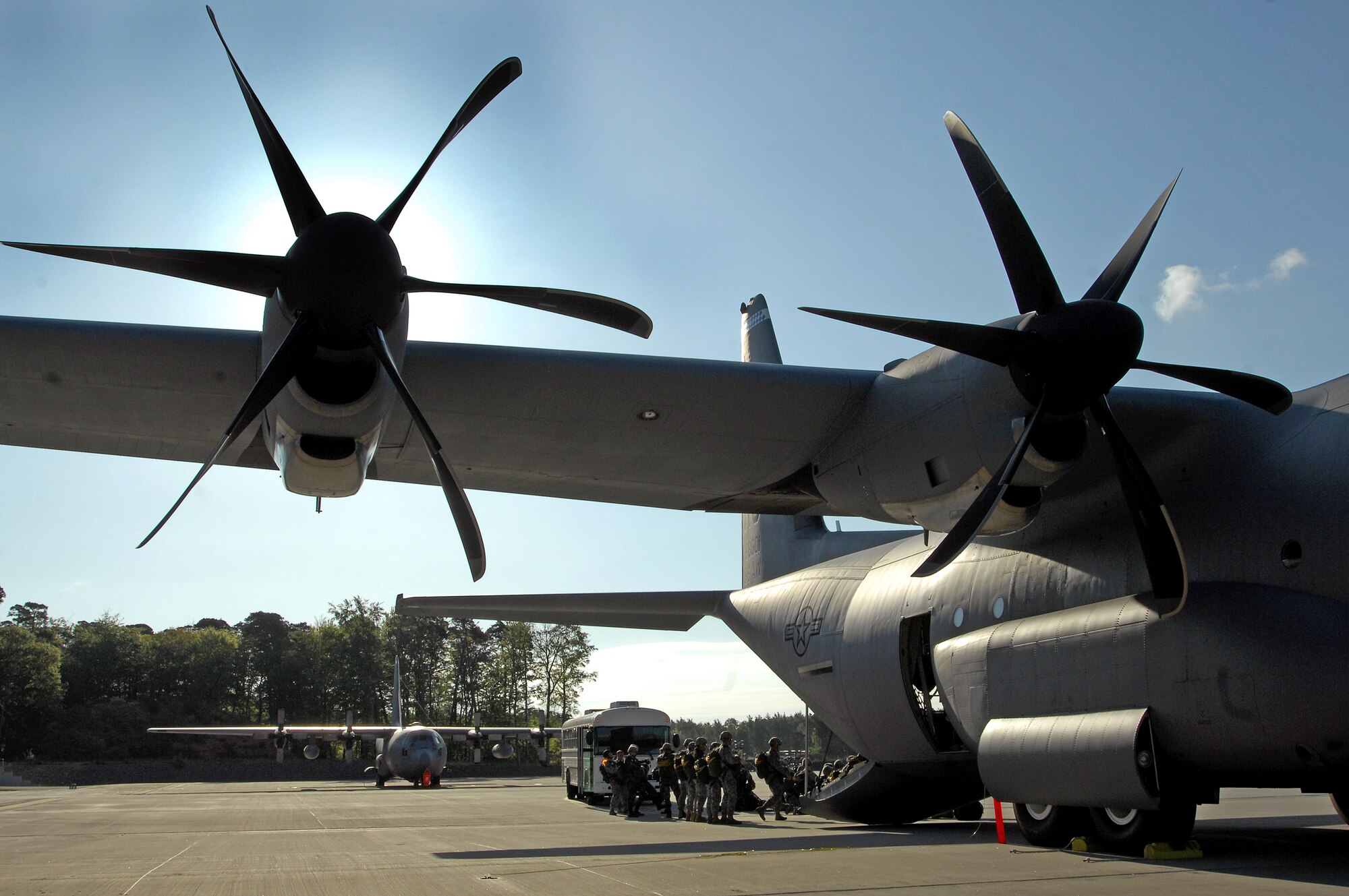 Airmen and Army paratroopers prepare to load for the first C-130J Super Hercules personnel drop from Ramstein Air Base, Germany. (U.S. Air Force photo/Senior Airman Kenny Holston) 
