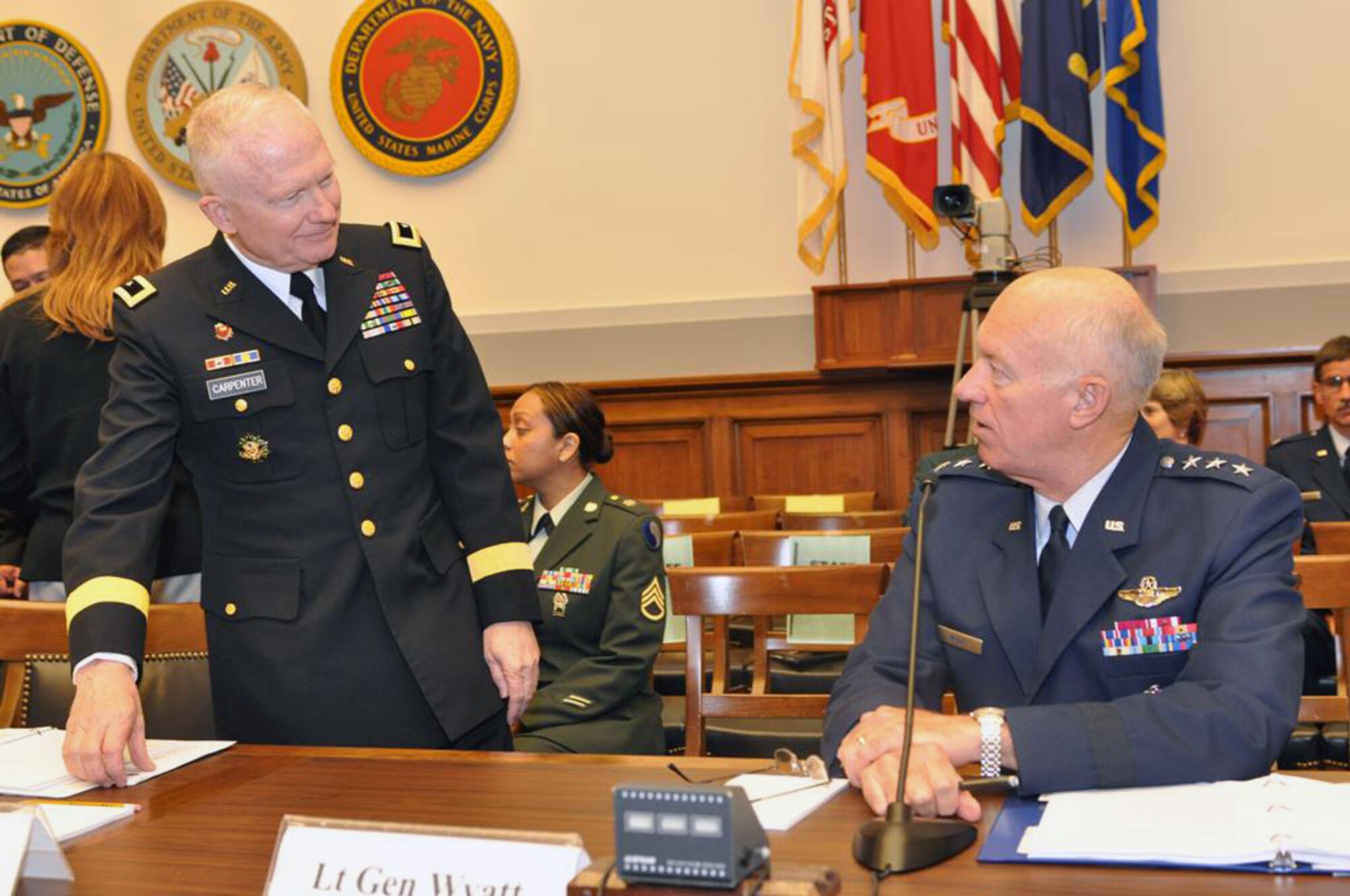 Maj. Gen. Raymond W. Carpenter, acting deputy director of the Army National Guard, and Lt. Gen. Harry M. Wyatt III, director of the Air National Guard, prepare to testify before the House Armed Services Committee Air and Land Forces Subcommittee on May 5, 2009. (U.S. Army photo by Staff Sgt. Jim Greenhill) (Released)