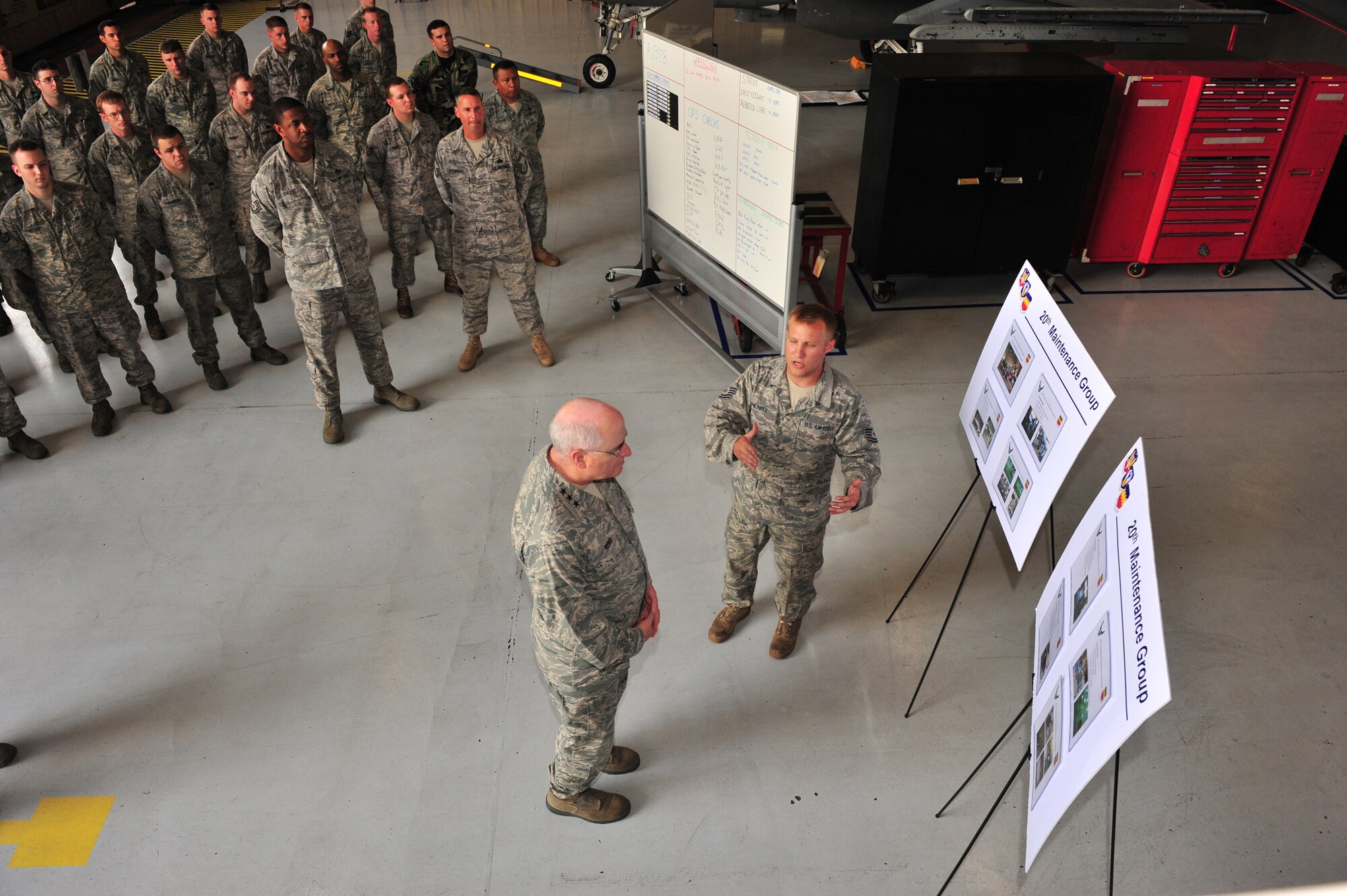 Shaw Air Force Base, S.C.- Lieutenant General Loren Reno, Deputy Chief of Staff for Logistics, receives an "Air Force Smart Operations 21" briefing from TSgt David Henry, assistance section chief for crash recovery, 20th Equipment Maintenance Squadron, May 6, 2009.  LtGen Reno spent most of the day touring Shaw AFB, learning how each duty section was making improvements using AFSO 21 and hearing the thoughts of the Airmen who work at Shaw.  (U.S. Air Force Photo by Senior Airman William Coleman)
