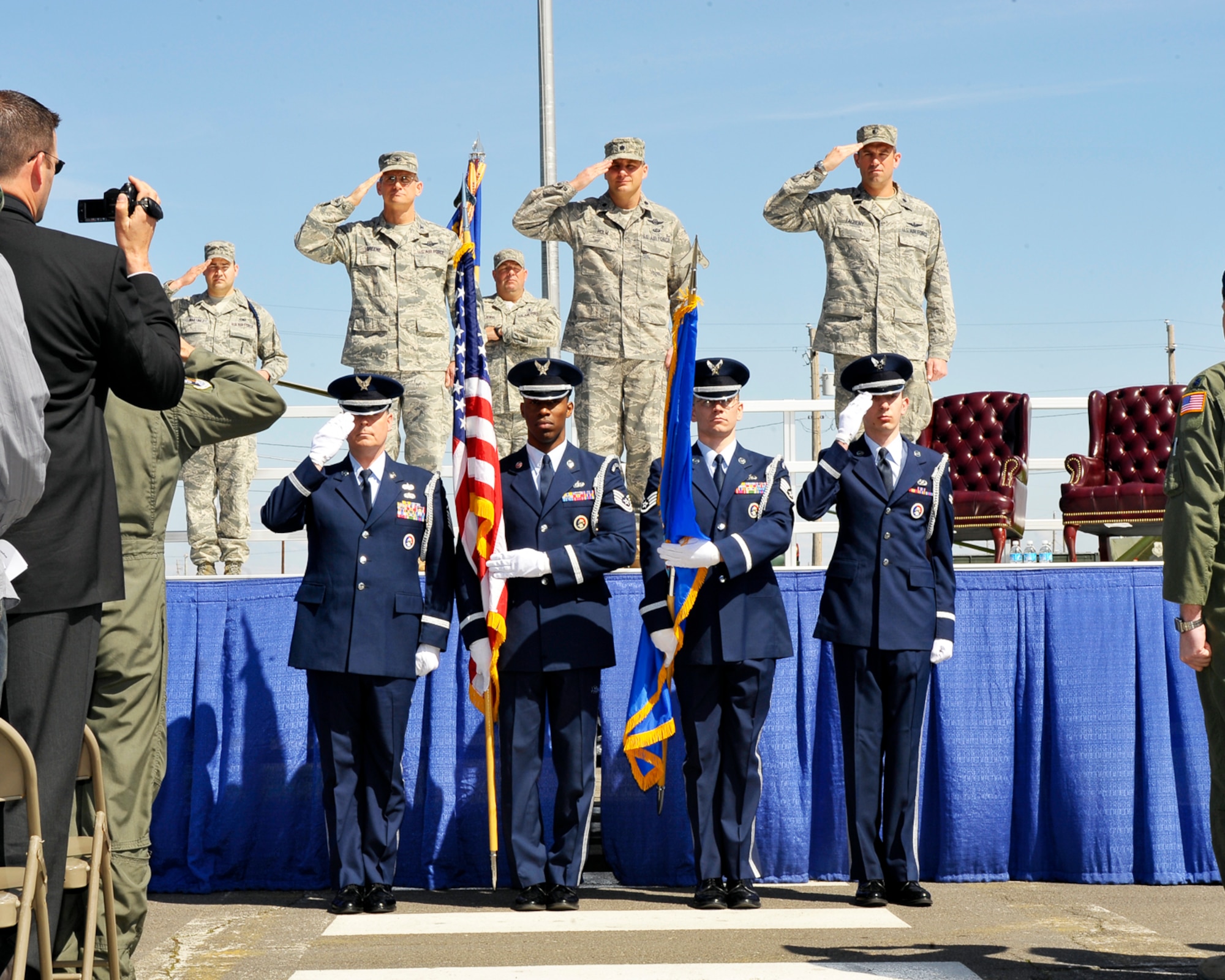 Honor Guard members lower the U.S. Flag during the singing of the National Anthem during the 66th Training Squadron Change of Command at the 336th Training Group Headquarter building May 1. (U.S. Air Force photo / Senior Airman Joshua K. Chapman)