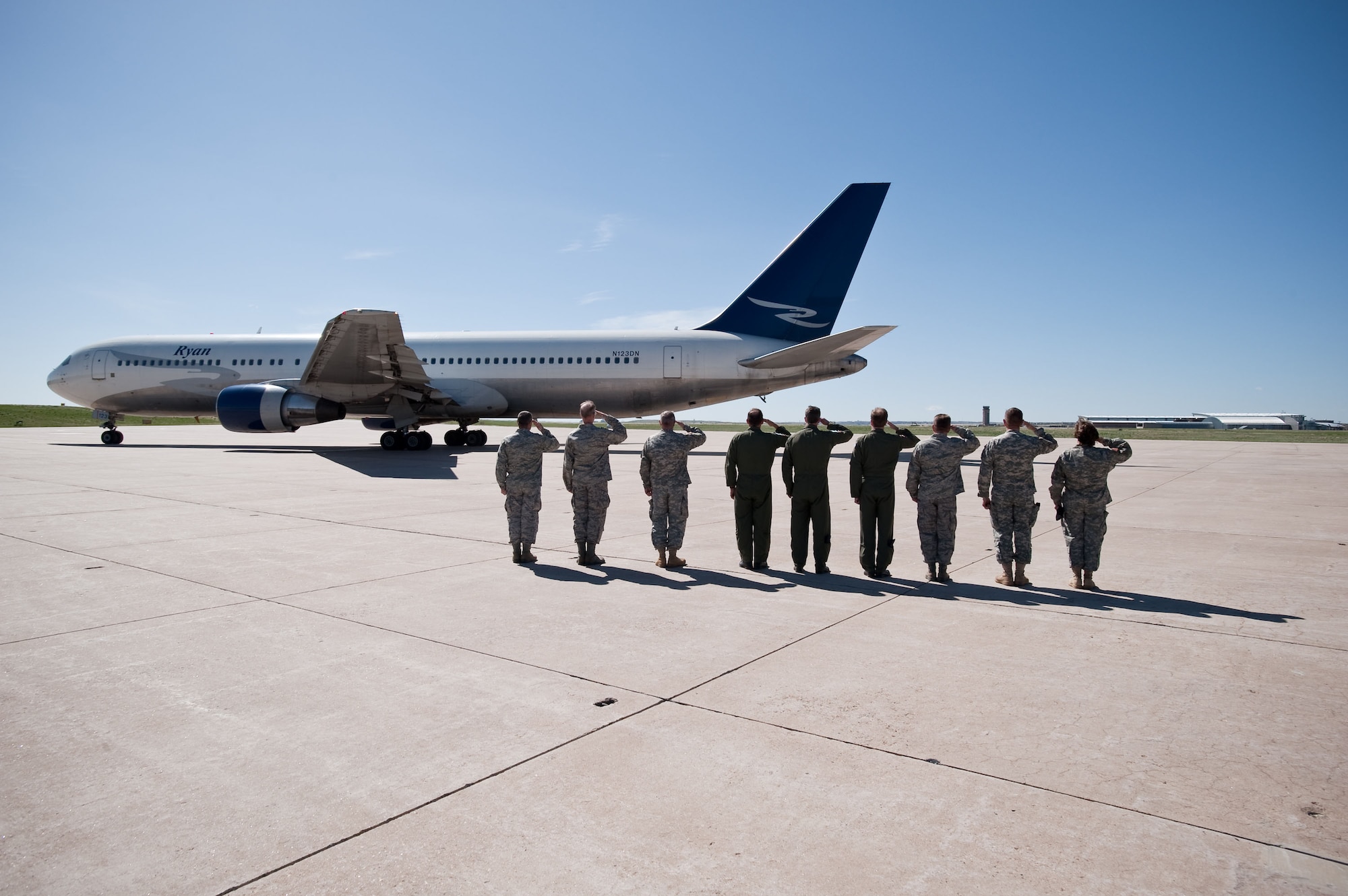 Commanders and senior staff of the Colorado National Guard Joint Force Headquarters and 140th Wing salute the departure of more than 200 Airmen deploying to Iraq in support of Operation Iraqi Freedom. (U.S. Air Force photo/Master Sgt. John Nimmo, Sr.) (RELEASED)