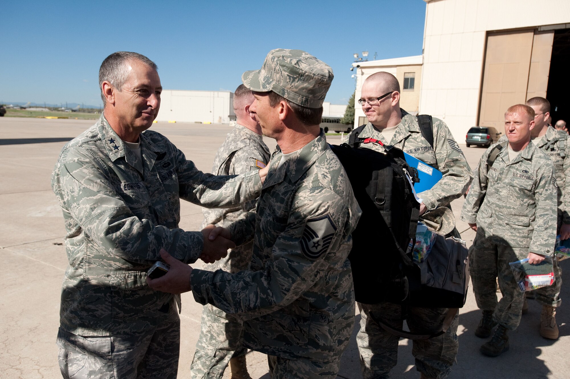 Major General H. Michael Edwards, Adjutant General, Colorado National Guard greets each Airman before they depart for Iraq. More than 200 Colorado Air National Guardsman are deploying in support of Operation Iraqi Freedom. (U.S. Air Force photo/Master Sgt. John Nimmo, Sr.) (RELEASED)