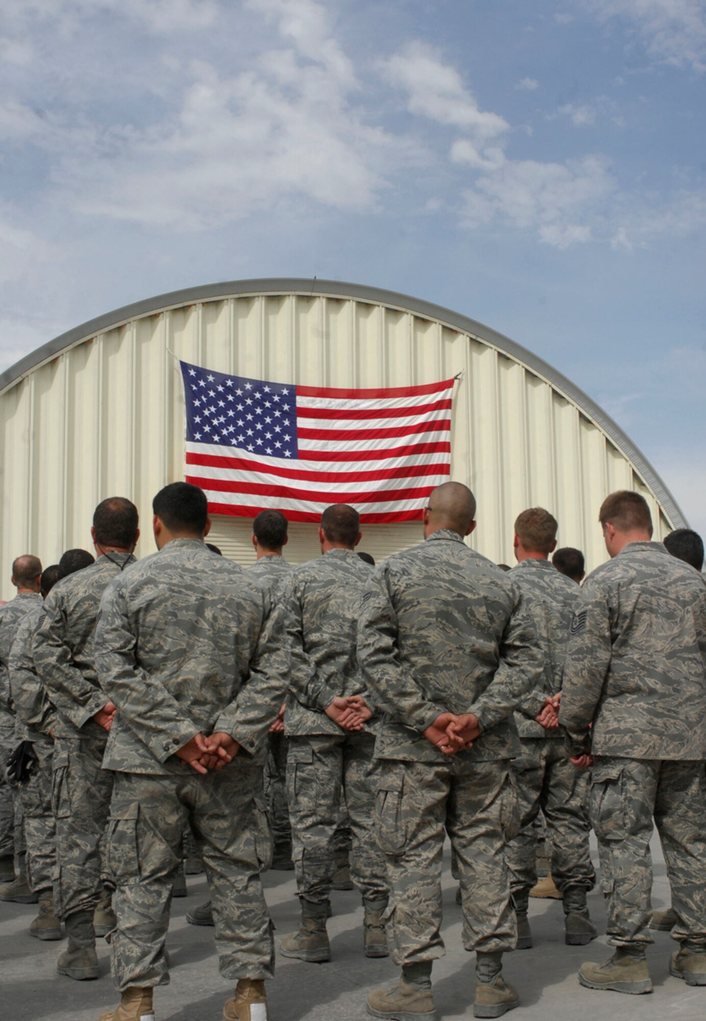 Members of the 1st Expeditionary Special Operations Maintenance Squadron, stand in formation during a building dedication ceremony for Staff. Sgt. Casey Crate at Bagram Air Field, Afghanistan, May 1. Sergeant Crate, a combat controller, was killed on his first deployment on May 30, 2005, in a aircraft crash in central Iraq. (U.S. Air Force photo/ Senior Airman Erik Cardenas)(Released)
