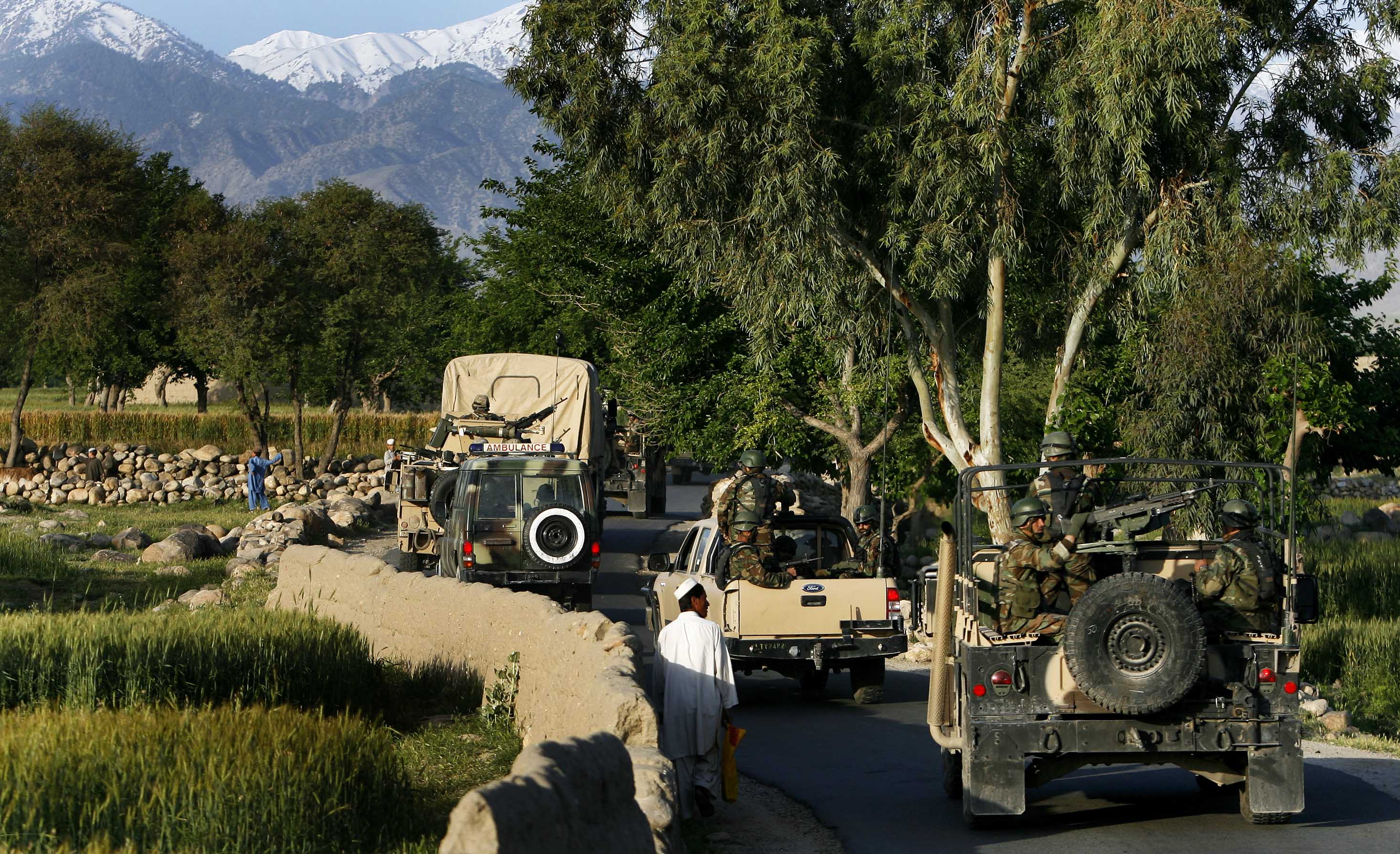 Afghan National Army commandos of the 201st Corps, assisted by members
