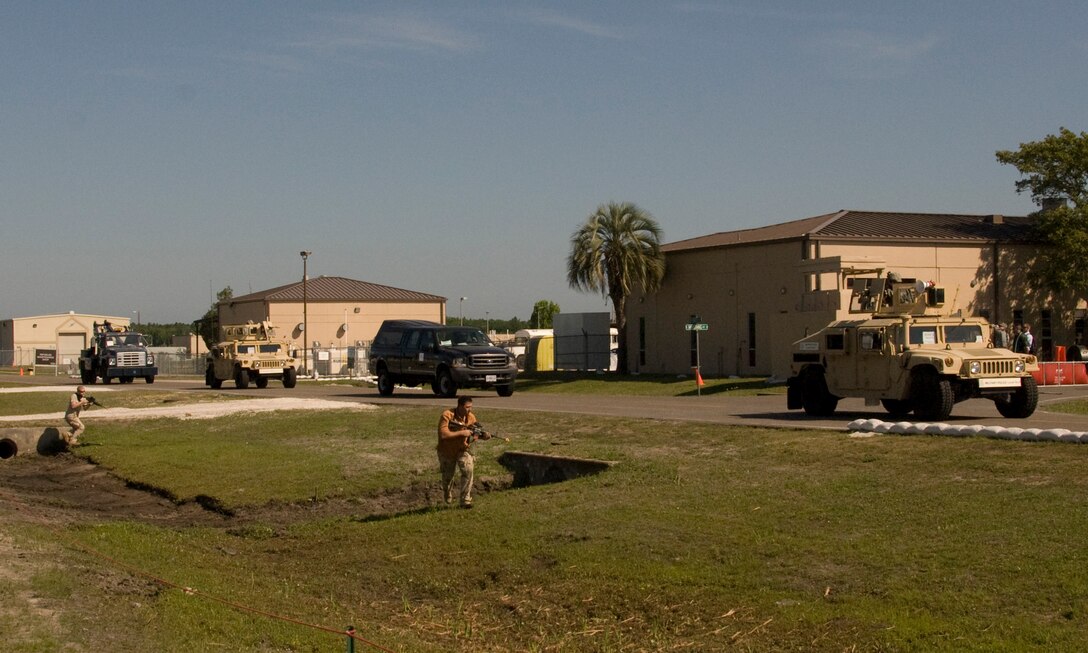 ACC/IG team members posing as insurgents attack 125th Fighter Wing members on a convoy during an Operational Readiness Inspection Phase II at the 125th Fighter Wing, Jacksonville, Florida, May 8, 2009.  The ORI Phase II analyzes the unit's ability to fight and survive from a deployed base. (Air National Guard Photo by Master Sgt. Larry Show)