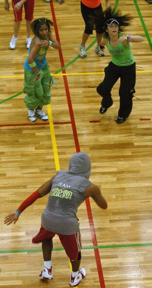 YOKOTA AIR BASE, Japan -- More than 75 people took part in Yokota's Latin American Club first-ever Zumbathon May 9 at the Samurai Fitness Center. Zumba, which combines Latin music and dance with easy to follow moves, is currently one of the fastest growing fitness programs in the world. Zumba classes are offered from 5-6 a.m. Wednesdays and 9-10 a.m. Saturdays at the fitness center annex. (U.S. Air Force photo/Master Sgt. Matt Summers)