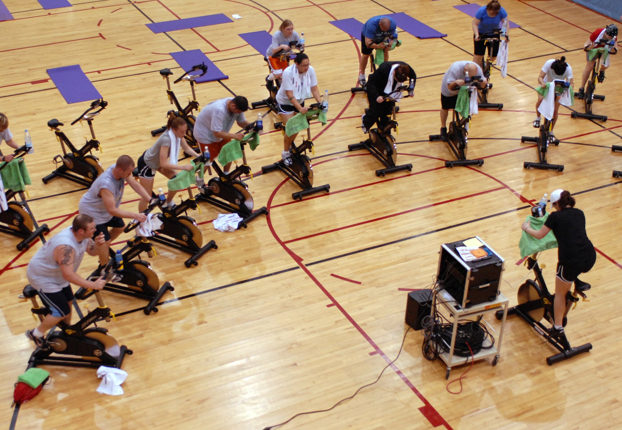 Wolf Pack airmen participate in a spin class during the Aerob-a-thon at Kunsan Air Base, Republic of Korea, May 9. The The Aerob-a-thon was a special event held by the 8th Force Support Squadron and conducted as part of May Fitness Month. (U.S. Air Force Photo/Senior Airman Gustavo Gonzalez)
