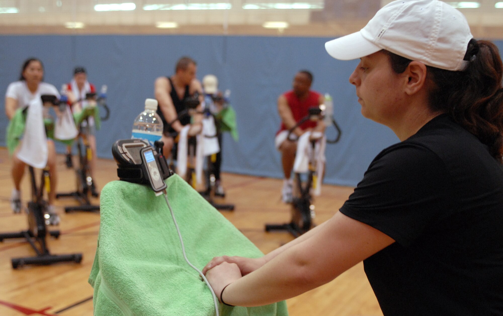 Staff Sgt. Jennifer Diana, 8th Aircraft Maintenance Squadron, instructs a spin class during the Aerob-a-thon at Kunsan Air Base, Republic of Korea, May 9. The The Aerob-a-thon was a special event held by the 8th Force Support Squadron and conducted as part of May Fitness Month. (U.S. Air Force Photo/Senior Airman Gustavo Gonzalez)