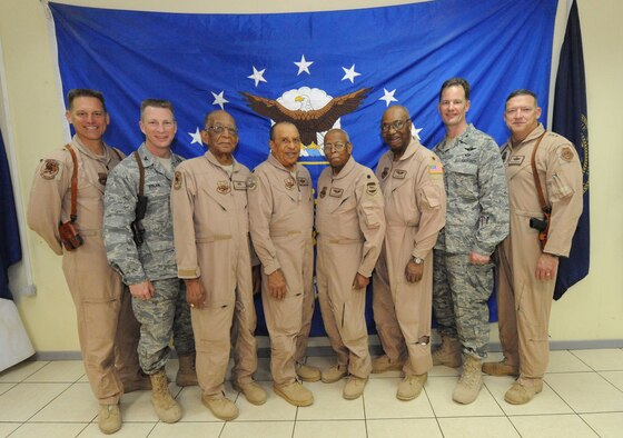 JOINT BASE BALAD, Iraq -- Four Original Tuskegee Airmen met current members of Air Force Reserve Command’s 477th Fighter Group (originally the 477th Medium Bombardment Group) and 332nd Air Expeditionary Wing (originally the 332nd Fighter Group) during a three-day visit here April 25. Staff Sgt. Philip Broome, Lt. Col. James Warren, Lt. Col. Alexander Jefferson and Maj. George Boyd are joined by Brig. Gen. Brian Bishop, 332nd AEW commander, Col. John Dolan, 332nd AEW vice commander, Col. Eric Overturf, 506th Air Expeditionary Group, (deployed from the 477th FG at Elmendorf Air Force Base, Alaska) and Lt. Gen. Gary North, commander for 9th Air Force and U.S. Air Forces Central Command. (U.S. Air Force photo/Senior Airman Tiffany Trojca)