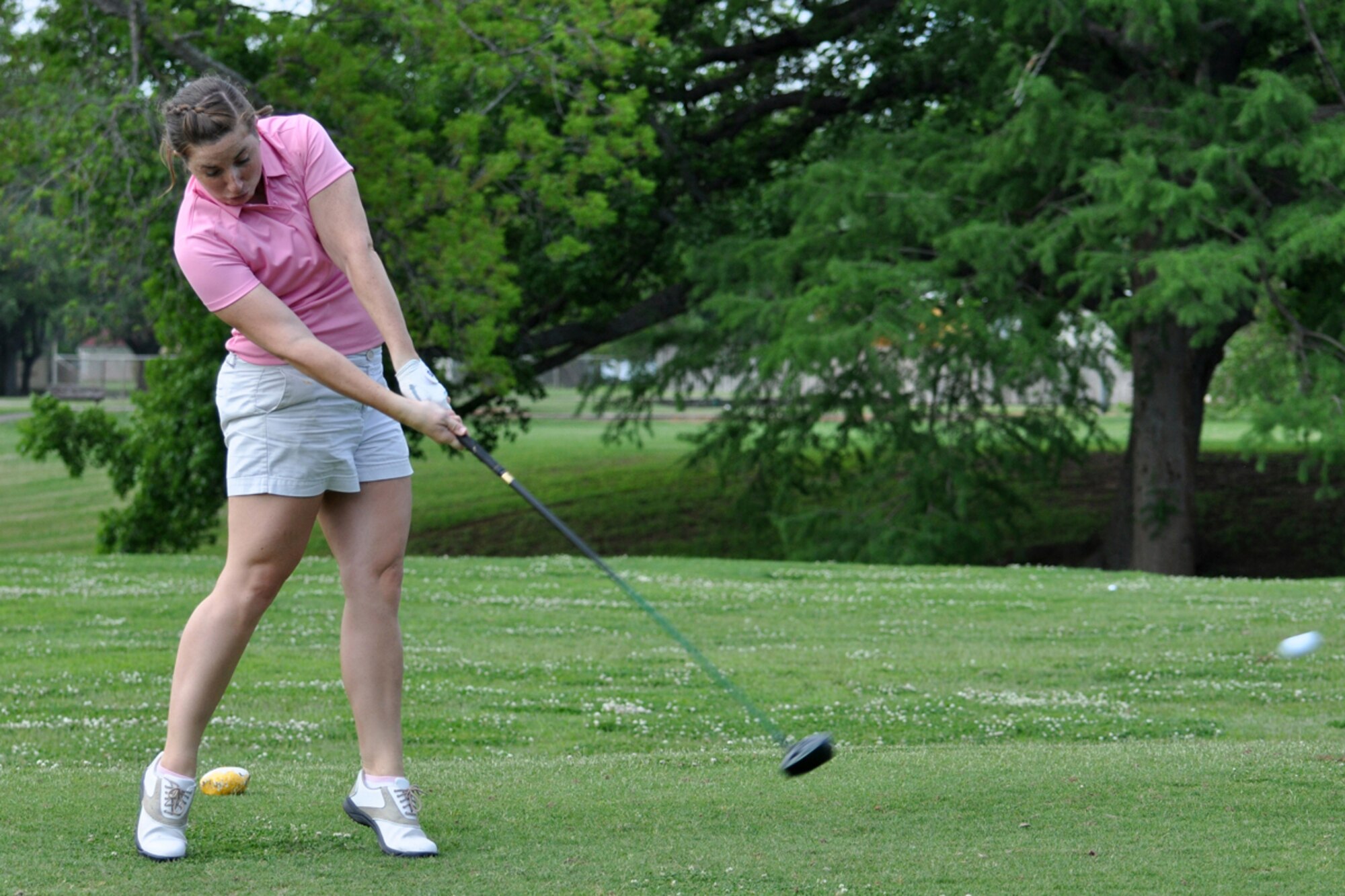 Mallory Rushing swings away during the 917th Wing’s Commander’s Cup Golf Tournament at the Fox Run Golf Course on Barksdale Air Force Base, La., May 2, 2009. Rushing works in the 47 Fighter Squadron Intel shop at Barksdale. The golf tournament is an annual event in conjunction with the 917th’s Family day celebration. (US Air Force photo/Tech. Sgt. Jeff Walston) 