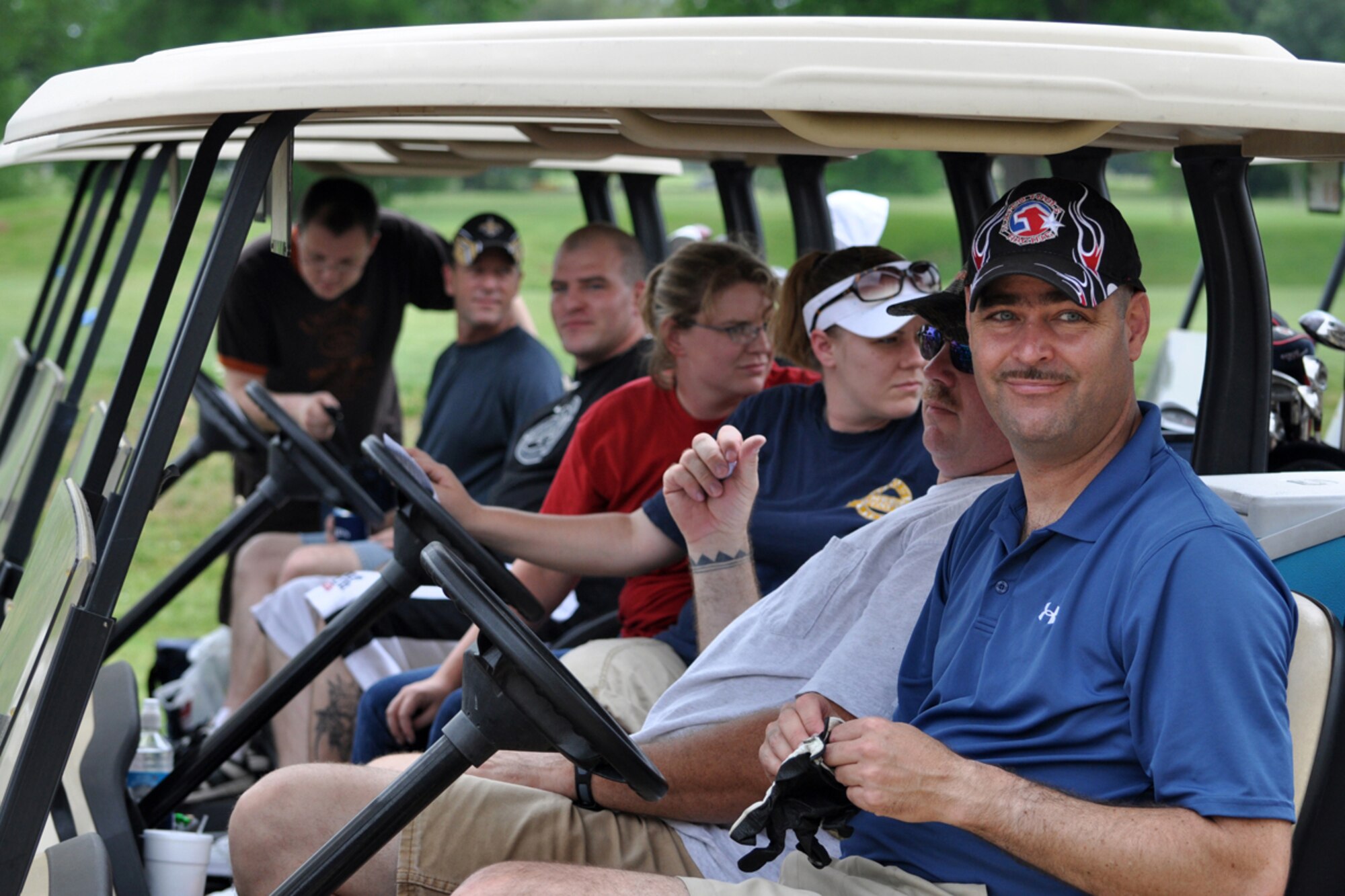Tony Johnson prepares himself for the “running of the carts” to start the 917th Wing’s Commander’s Cup Golf Tournament at the Fox Run Golf Course on Barksdale Air Force Base, La., May 2, 2009. Johnson works for the 917th Maintenance Squadron at Barksdale. The golf tournament is an annual event in conjunction with the 917th Wing’s Family Day celebration. (US Air Force photo/Tech. Sgt. Jeff Walston)
