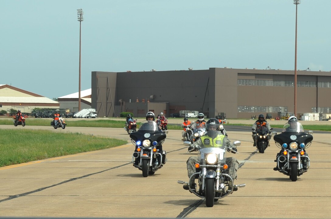LANGLEY AIR FORCE BASE, Va. -- Airmen participate in a motorcycle slow run down the runway during the annual motorcycle safety day here May 8. The annual event is a command directed event for the 101 Critical Days of Summer that ensures motorcyclists practice the rules of the road. (U.S. Air Force photo/Senior Airman Ashley Hawkins)

