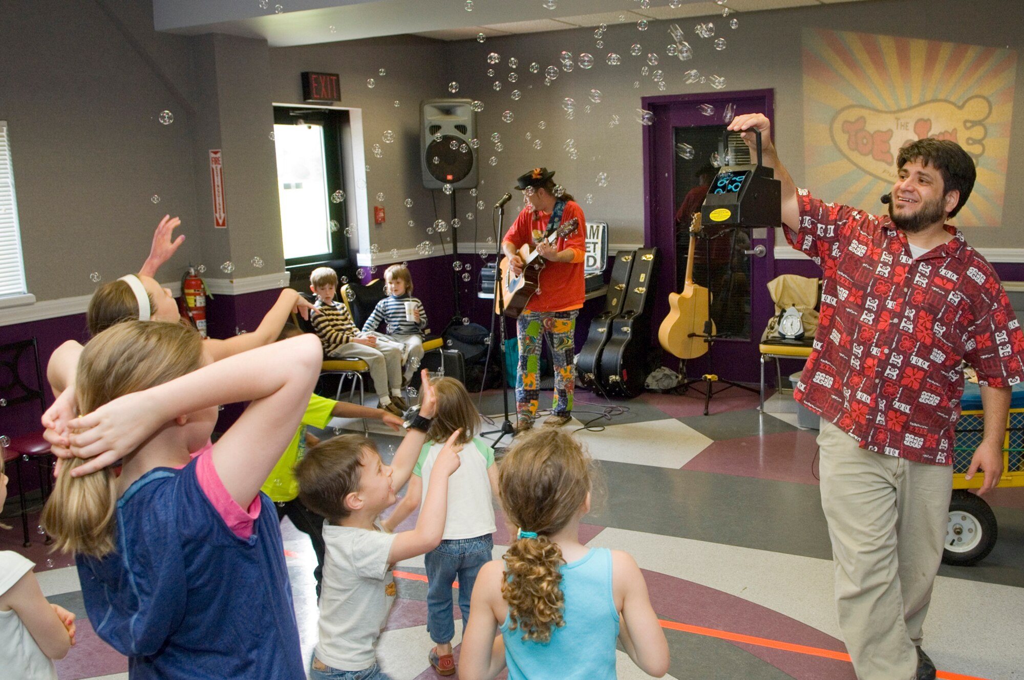 HANSCOM AIR FORCE BASE, Mass. –Vinny Lovegrove of the Toe Jam Puppet Band makes bubbles for children participating in the Bop ‘n’ Bowl event, May 9, at the Hanscom Lanes. The free event included music, games and activities including bowling. (U.S. Air Force photo by Mark Wyatt) 