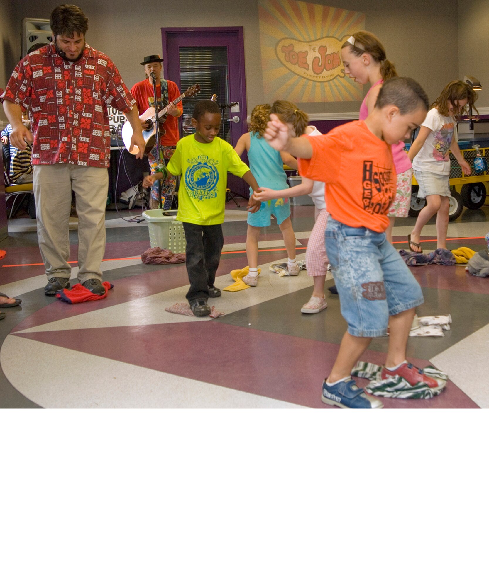 HANSCOM AIR FORCE BASE, Mass. – Children enjoy some interactive fun with the Toe Jam Puppet Band during the Bop ‘n’ Bowl event, May 9, at the Hanscom Lanes sponsored by the 66th Services Squadron. For information on upcoming family events on base go to www.hanscomservices.com. (U.S. Air Force photo by Mark Wyatt)