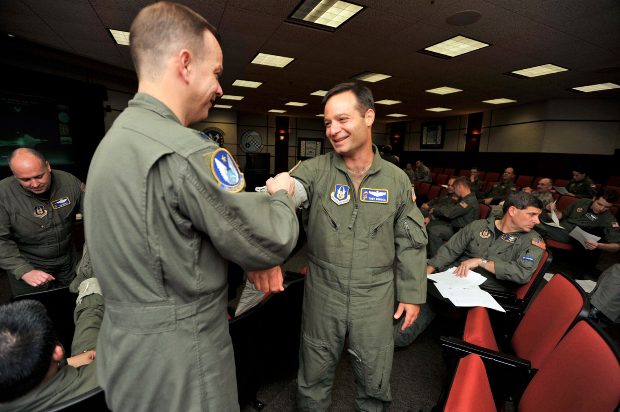 Lt. Col. Tony Brusca shares a laugh with Lt. Col. Charles Youngblood during a self-aid and buddy care class in April. Colonel Brusca has been selected to takeover as commander of the 18th Air Refueling Squadron during a change-of-command ceremony in June. The 18th ARS is the flying unit of the 931st Air Refueling Group, an Air Force Reserve unit at McConnell Air Force Base, Kan. Colonel Youngblood is a KC-135 Stratotanker pilot assigned to the 18th ARS. (U.S. Air Force photo/Tech. Sgt. Jason Schaap)