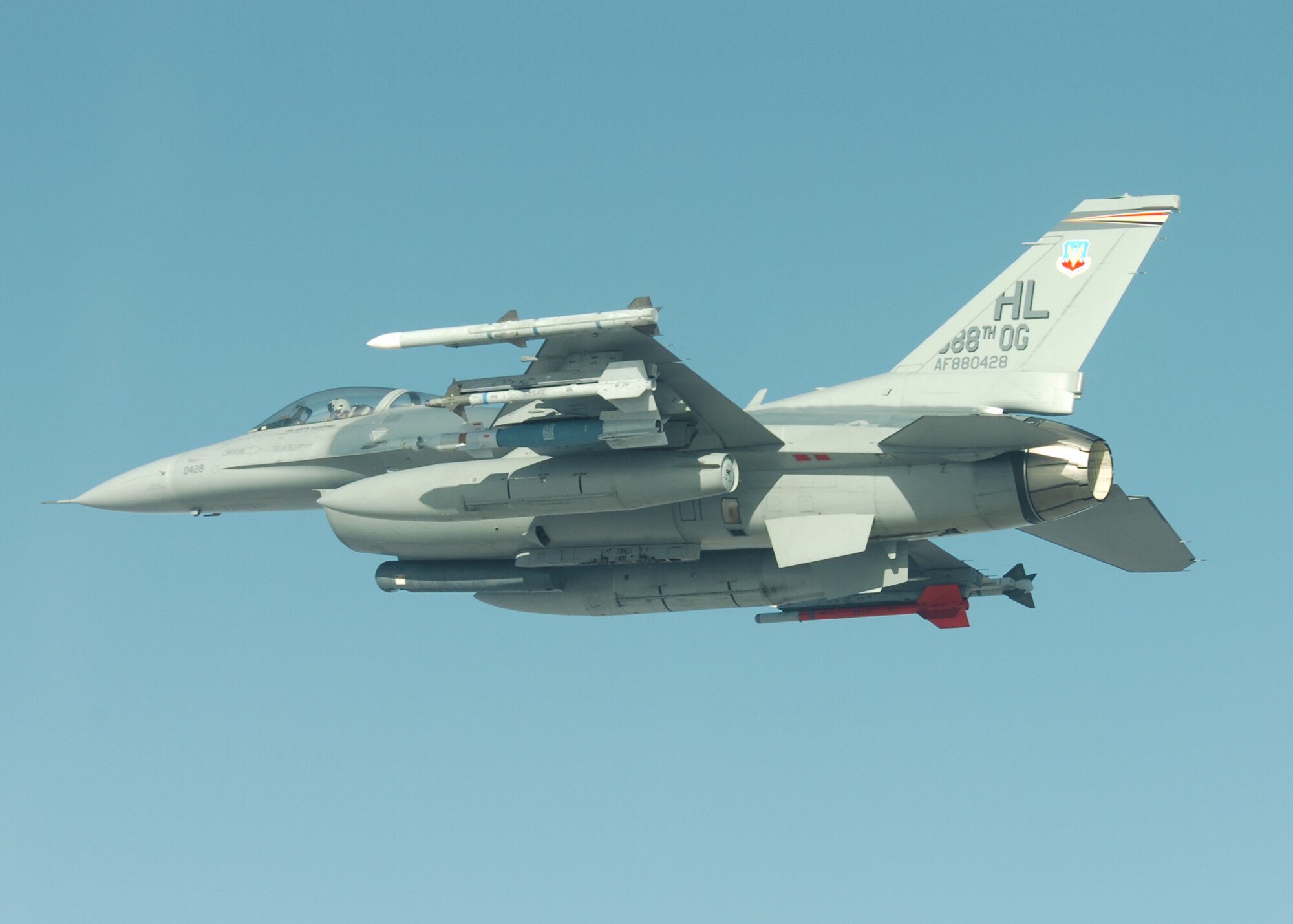 An F-16 from the 421st Fighter Squadron at Hill Air Force Base Utah, flies over Utah Test and Training Range during a Combat Hammer mission during a two-week large-scale evaluation. Combat Hammer is also known as a Weapons System Evaluation Program for air-to-ground weapons.  Almost every fighter in the Air Force inventory participated in this evaluation, which also included bombers and unmanned aircraft systems.  The 86th Fighter Weapons Squadron executes the 'Hammer' missions by evaluating the entire weapons process from loading to flight to the target.  (U.S. Air Force photo/Lt. Col. Eugene Booth.) 