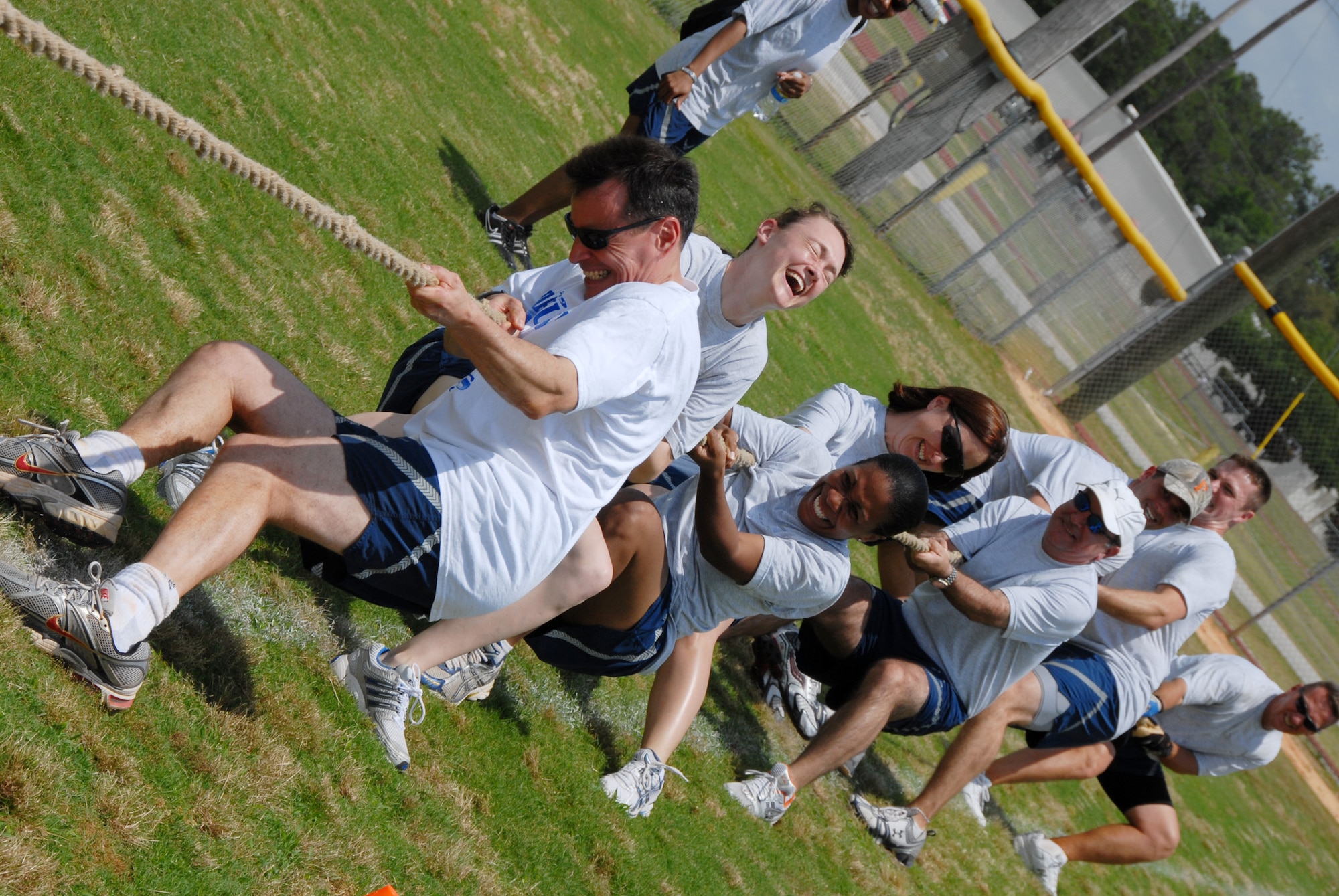 Col. Steve DePalmer, 53rd Wing commander, leads a wing staff team in a tug-o-war match during the 53rd Wing's sports day/commander farewell May 8 at Eglin Air Force Base.  Colonel DePalmer departs Eglin for his new assignment as the vice commander of 14th Air Force.  (U.S. Air Force photo/ Samuel King Jr.)