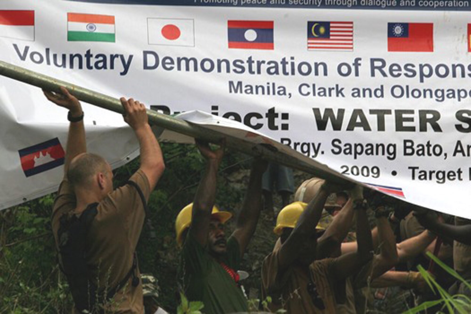 Civilians and military personnel from the United States, Japan, Australia, Indonesia and Papua-New Guinea teamed up to improve the infrastructure and water supply in Sapang Bato, Philippines, as part of the 2009 Association of Southeast Asian Nations Regional Forum Voluntary Demonstration of Response on Disaster Relief May 2 through 8. (Courtesy photo)