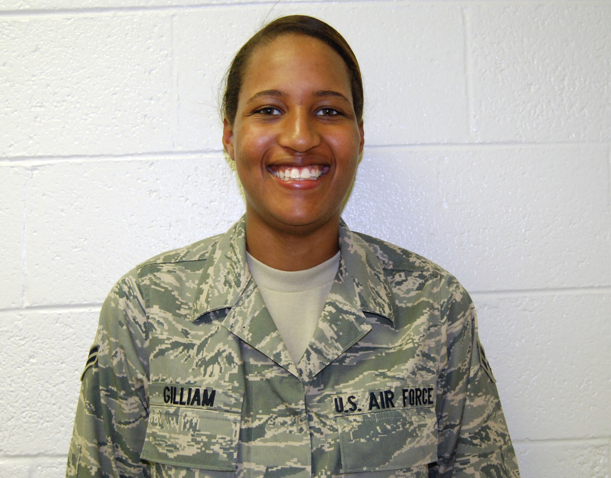 Airman 1st Class Justina Gilliam joined the 46th Aerial Port Squadron and will be assigned to the cargo section. The San Antonio, Texas, native is currently in school pursuing a nursing degree. She enjoys playing volleyball and other outdoor sports. (U.S. Air Force photo/Staff Sgt. Steve Lewis) 
