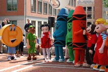 ALEXANDRIA, Va. - The 'Parade of Characters' enjoy their welcome at the U.S. Patent and Trademark Office's opening ceremony at the 2009 Expo May 8. The Air Force Trademark and Licensing Office was the first military branch to exhibit their trademarks at this event. The U.S. Air Force Band performed at the opening ceremony. (U.S. Air Force Photo/Jessica O'Haver)