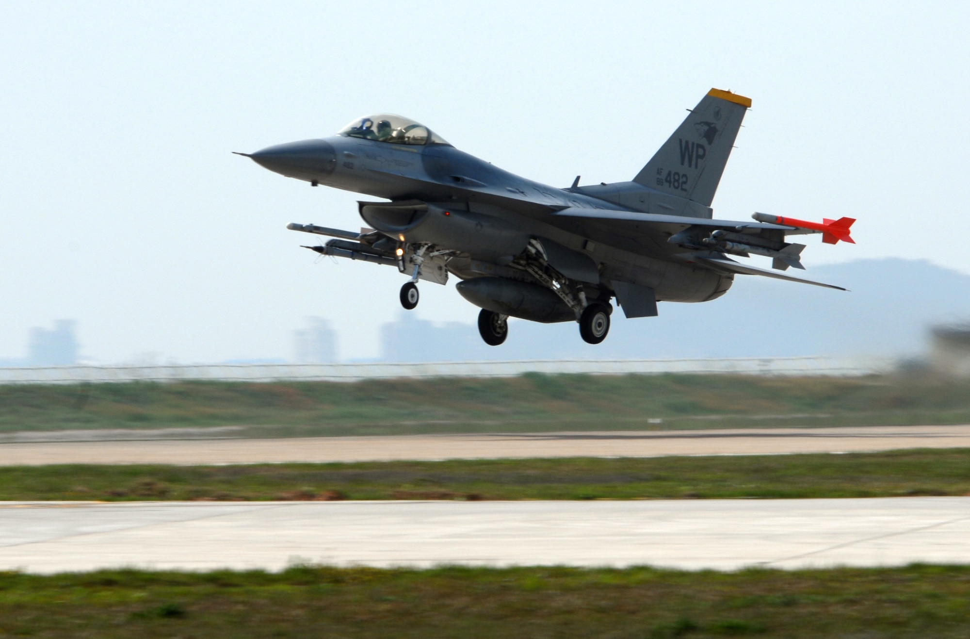 KUNSAN AIR BASE, Republic of Korea -- An F-16 Fighting Falcon from the 80th Fighter Squadron takes off during exercise Max Thunder 09-01 at Kunsan Air Base May 11. The second annual Max Thunder exercise is a 7th Air Force-designed, bi-lateral training opportunity that aims to test aircrews’ war-fighting skills in realistic combat situations that combine both Republic of Korea Air Force and U.S. Air Force flying and maintenance personnel.(U.S. Air Force Photo/Senior Airman Gustavo Gonzalez)