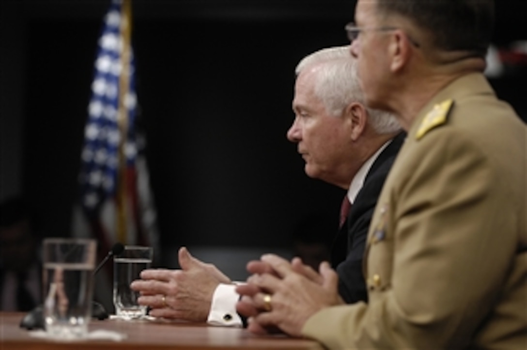 Secretary of Defense Robert M. Gates (left) and Chairman of the Joint Chiefs of Staff Adm. Michael Mullen, U.S. Navy, conduct a press briefing where they announce Army Lt. Gen. Stanley McChrystal is to replace Army Gen. David D. McKierna as commander of NATO's International Security Assistance Force and U.S. forces in Afghanistan in the Pentagon on May 11, 2009.  