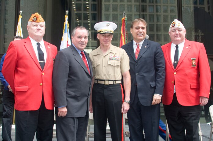 VIPs stand for pictures after the Marine Week Dedication Ceremony.