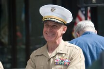 Brig. Gen. Melvin G. Spiese talks with spectators and visitors before the Marine Week Dedication Ceremony May 11.