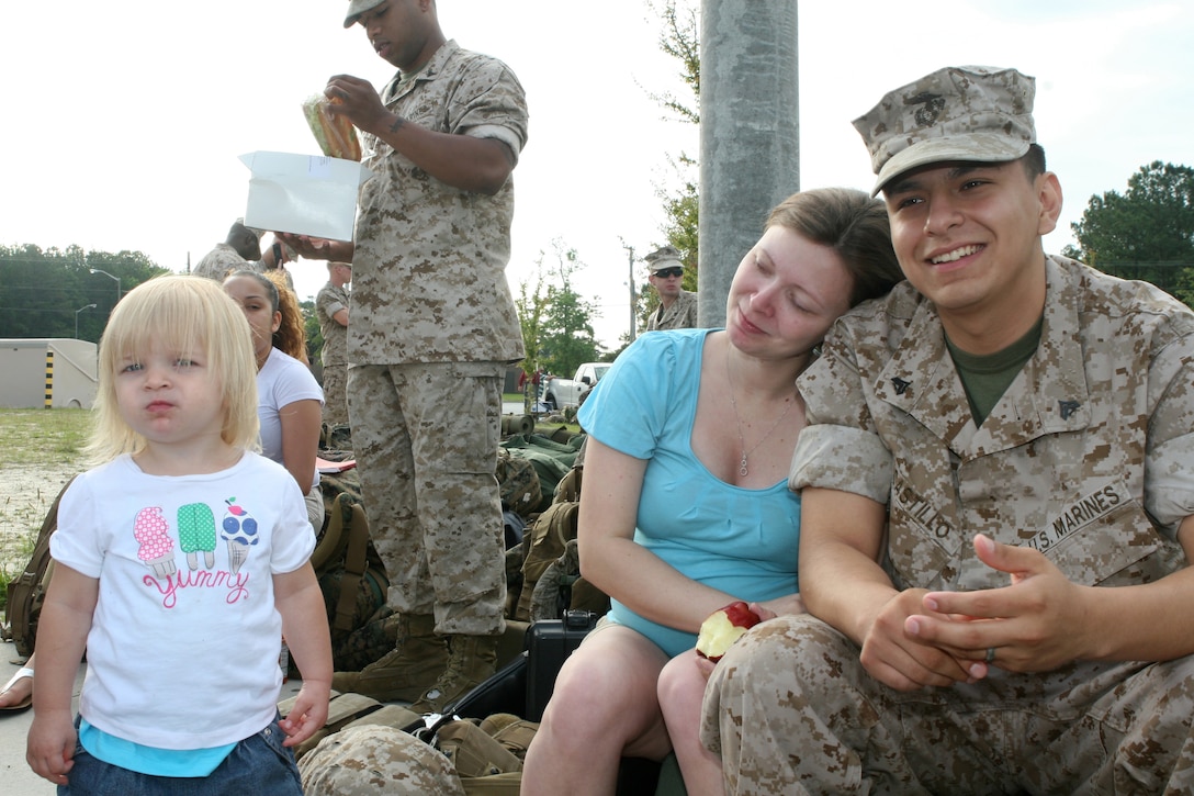 Cpl. Pedro H. Castillo, a legal clerk with the 22nd Marine Expeditionary Unit and New York native, spends time with his wife and daughter at the 22nd MEU barracks aboard Camp Lejeune, N.C., May 11, 2009, before he departs for the ships of Bataan Amphibious Ready Group. The MEU is deploying this week.  (Official Marine Corps Photo by Cpl. Justin M. Martinez)