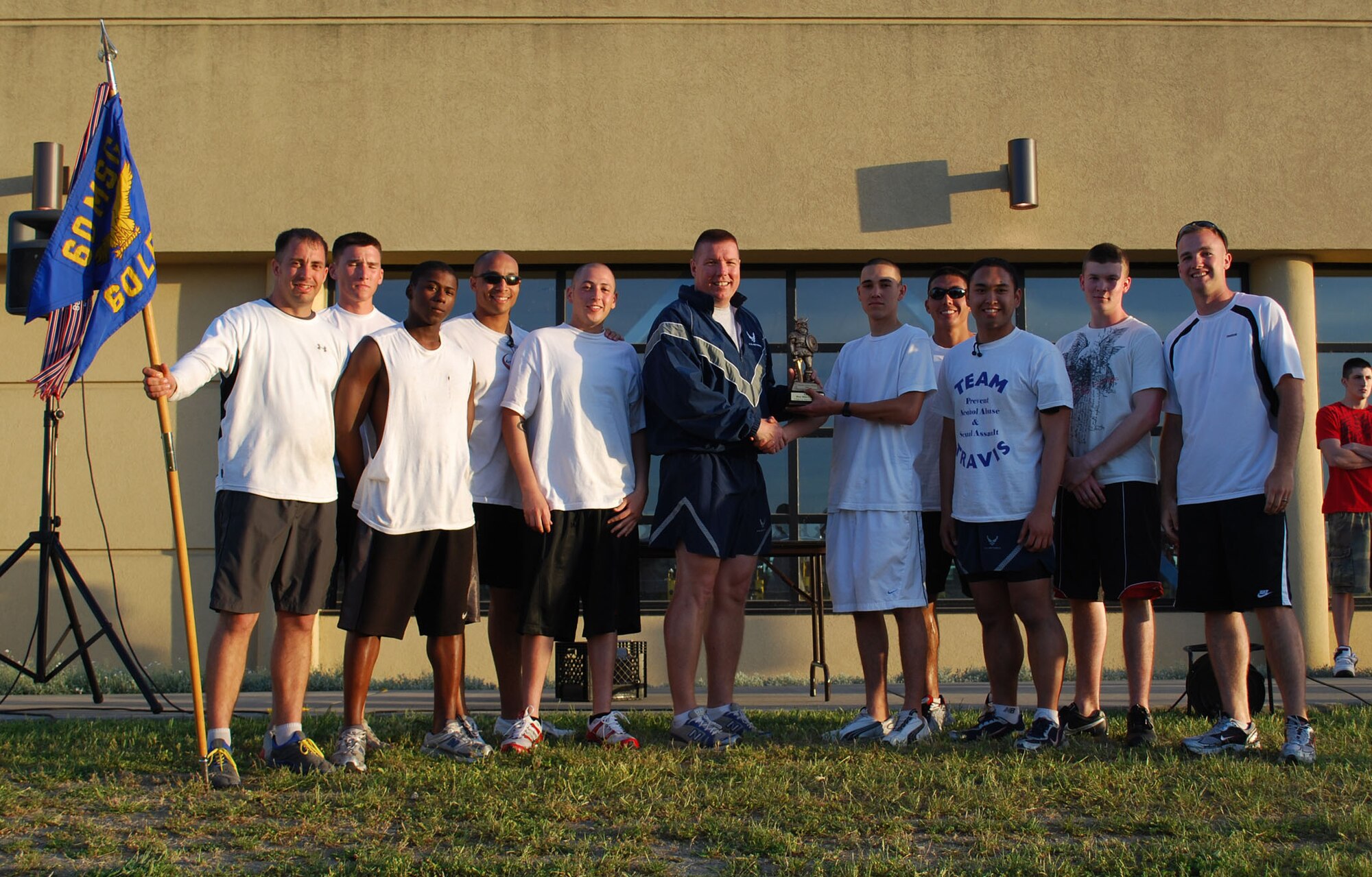 After completing 103 miles at Viking Challenge May 9, the 60th Logistics Readiness Squadron accepts their first place trophy from Col. John Lipinski, 615th Contingency Response Wing commander.  The team defended their 2008 Viking Challenge title by coming in first place with the most miles completed – just one mile more than the 570th Global Mobility Squadron team in second place. (U.S. Air Force photo/1st Lt. Nicole Langley)

